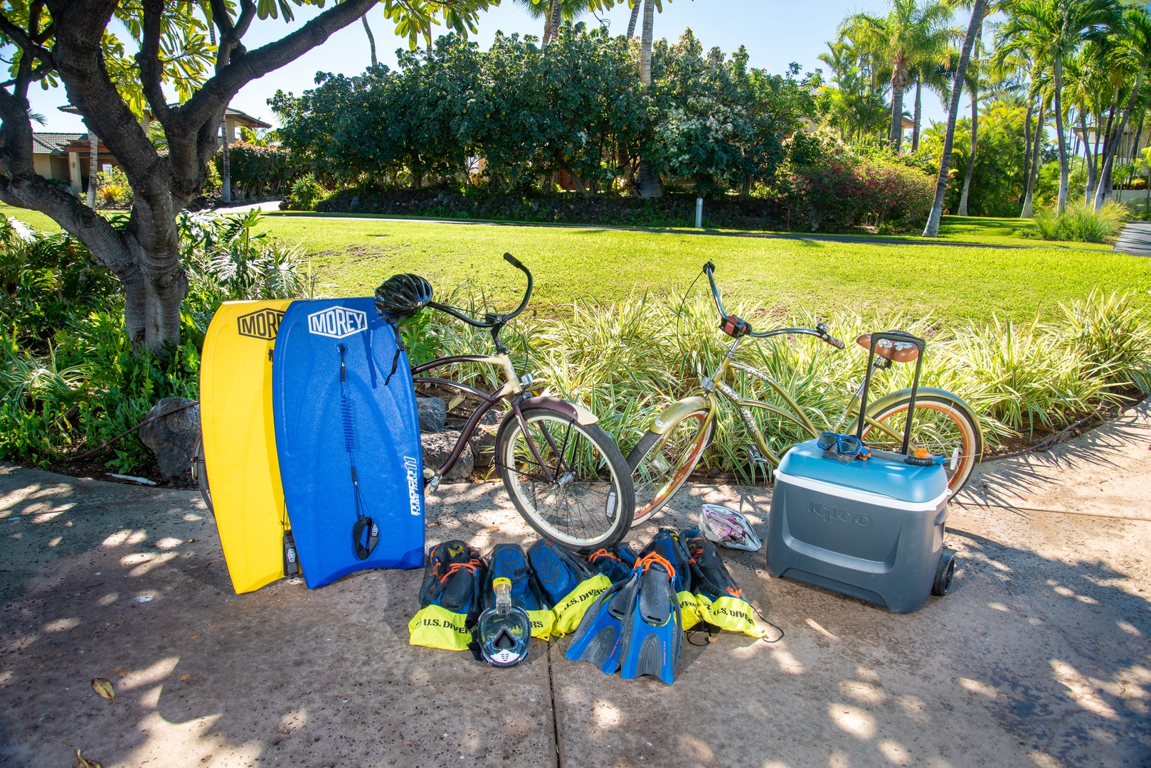 Kamuela Vacation Rentals, Champion Ridge Elegance - Outdoor equipment, including snorkel gear, boogie boards, bicycles, and cooler, ready for your adventures.