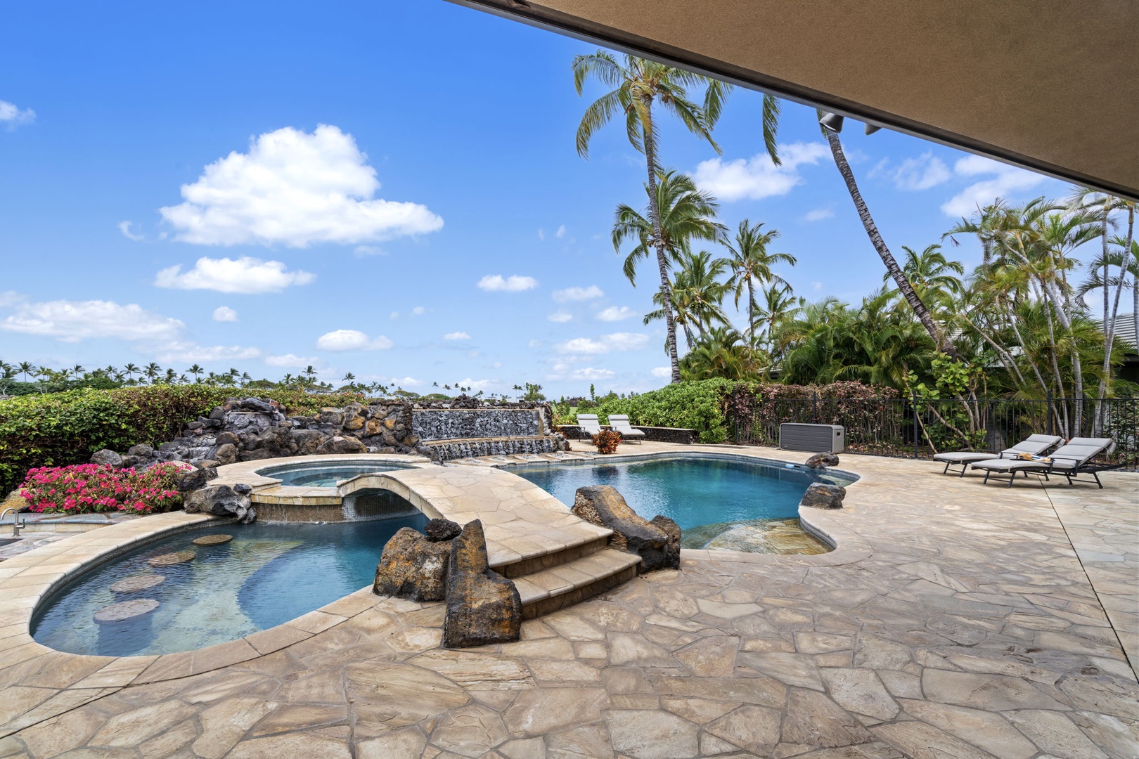 Kamuela Vacation Rentals, Hale Konane - Take in the tropical scenery while unwinding by the sparkling pool.