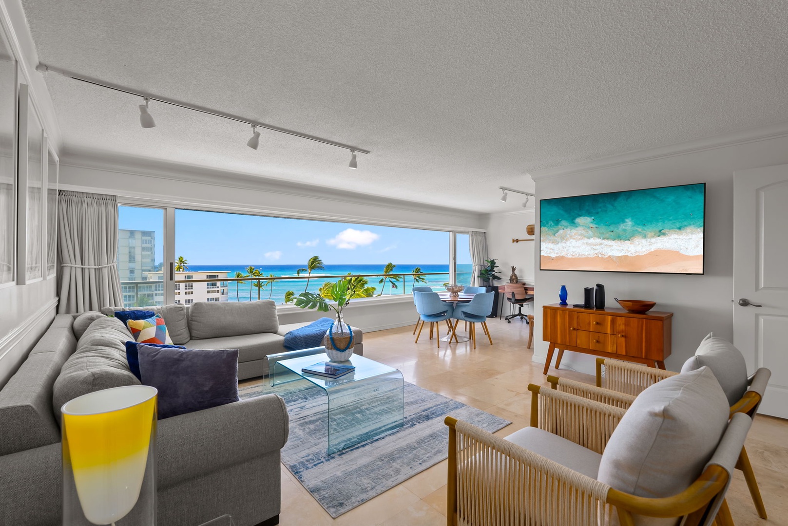 Honolulu Vacation Rentals, Colony Surf Getaway - Plush sofas with open space, welcoming the island breeze.