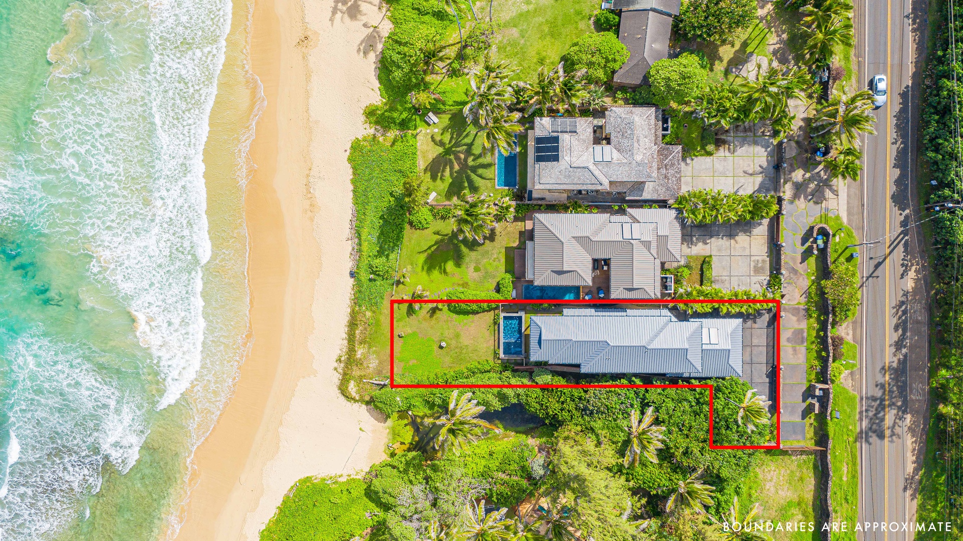 Laie Vacation Rentals, Majestic Mahakea Oceanfront Oasis - Overhead view of the property showcasing its beachfront location and spacious grounds.