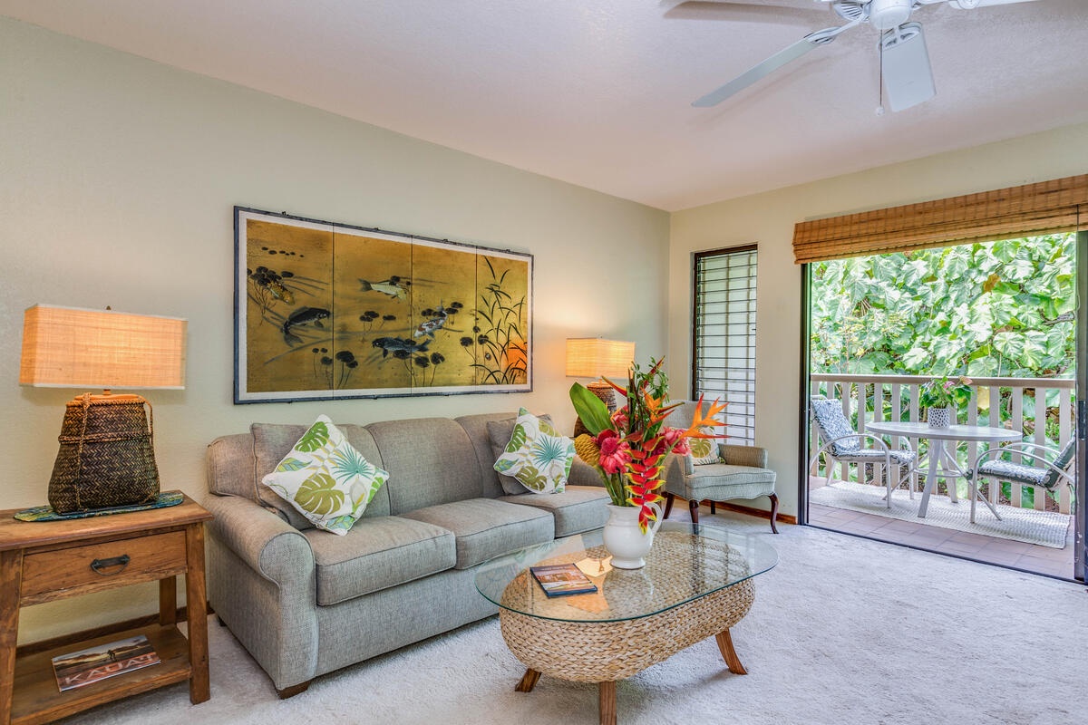 Koloa Vacation Rentals, Waikomo Streams 121 - The dining nook is set up almost like an art gallery, where from the glass table set for four, you can view the artwork showcasing the beauty of Hawai’i