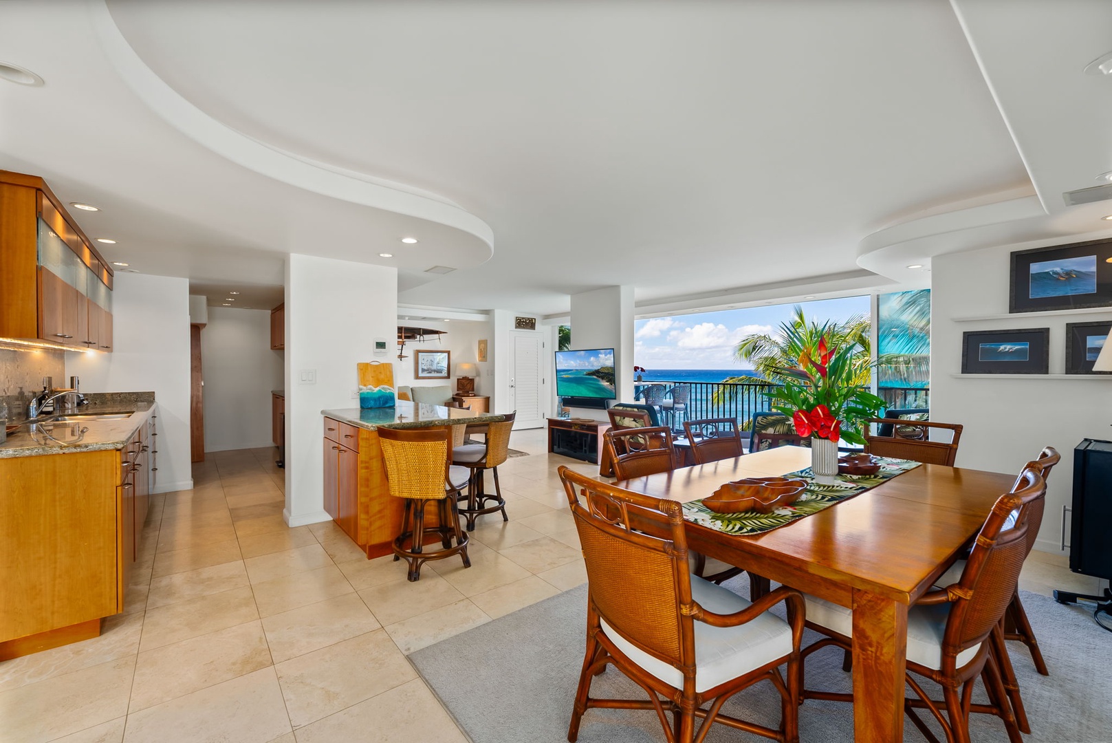 Honolulu Vacation Rentals, Kaimana Views - Open living and dining space with ocean views, offering a perfect blend of comfort and coastal elegance.