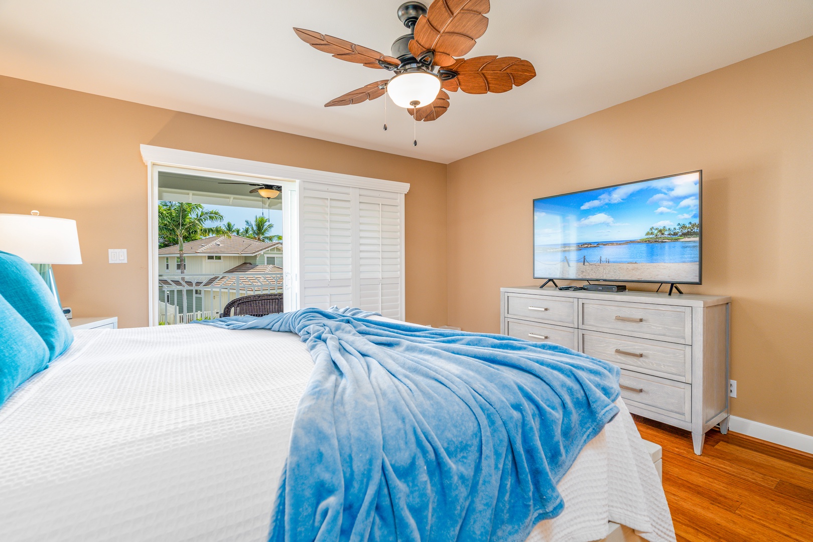 Kapolei Vacation Rentals, Ko Olina Kai 1081C - Relax and breathe in island air in the primary guest bedroom upstairs.