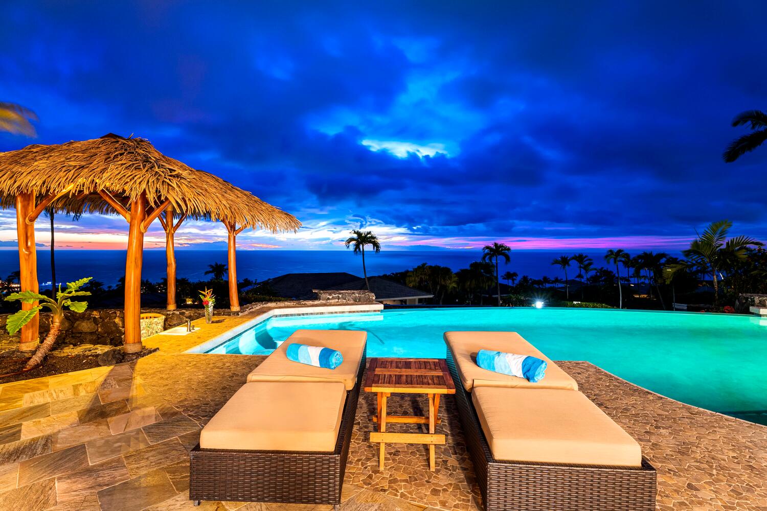 Kailua Kona Vacation Rentals, Island Oasis - As twilight descends, our palapa becomes a silhouette against the evening sky.