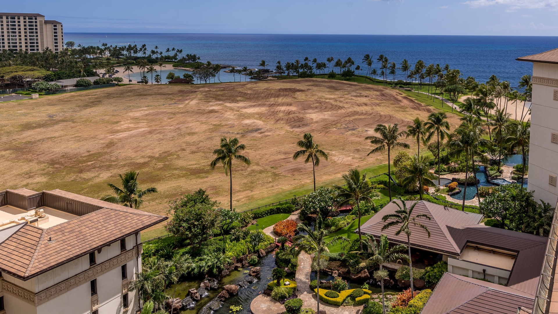 Kapolei Vacation Rentals, Ko Olina Beach Villas O1111 - Looking out over the pool and Koi ponds.