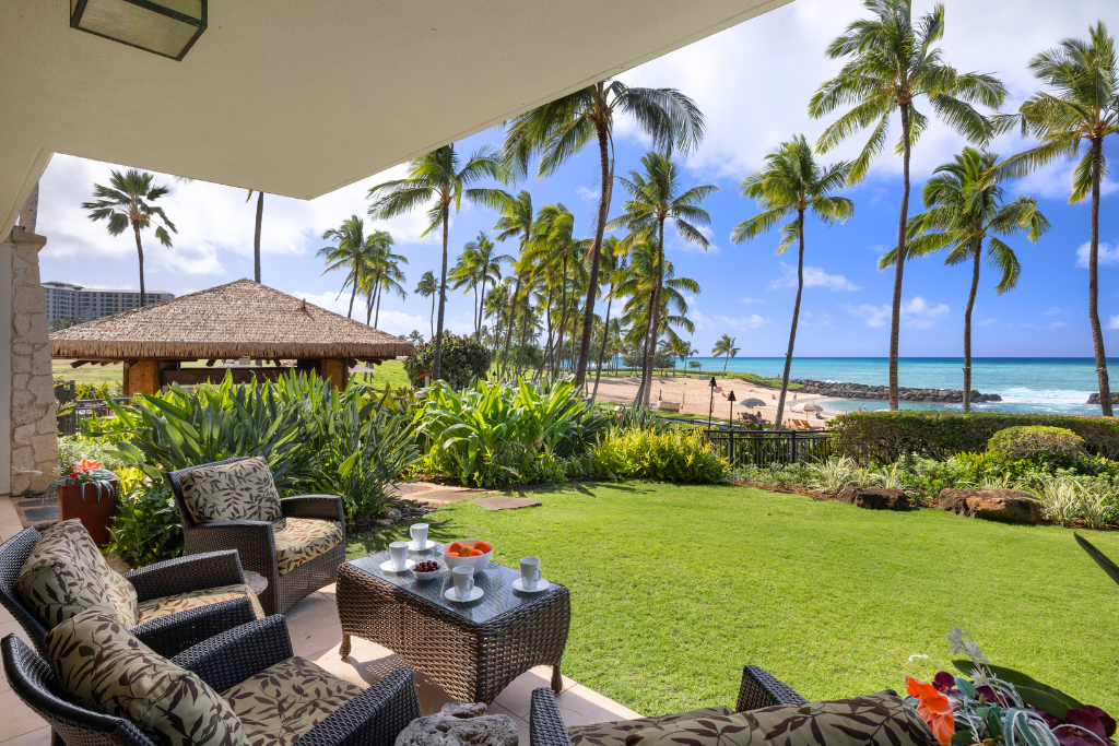 Kapolei Vacation Rentals, Ko Olina Beach Villas B109 - Relax on the lanai while enjoying the ocean view through the swaying palms.