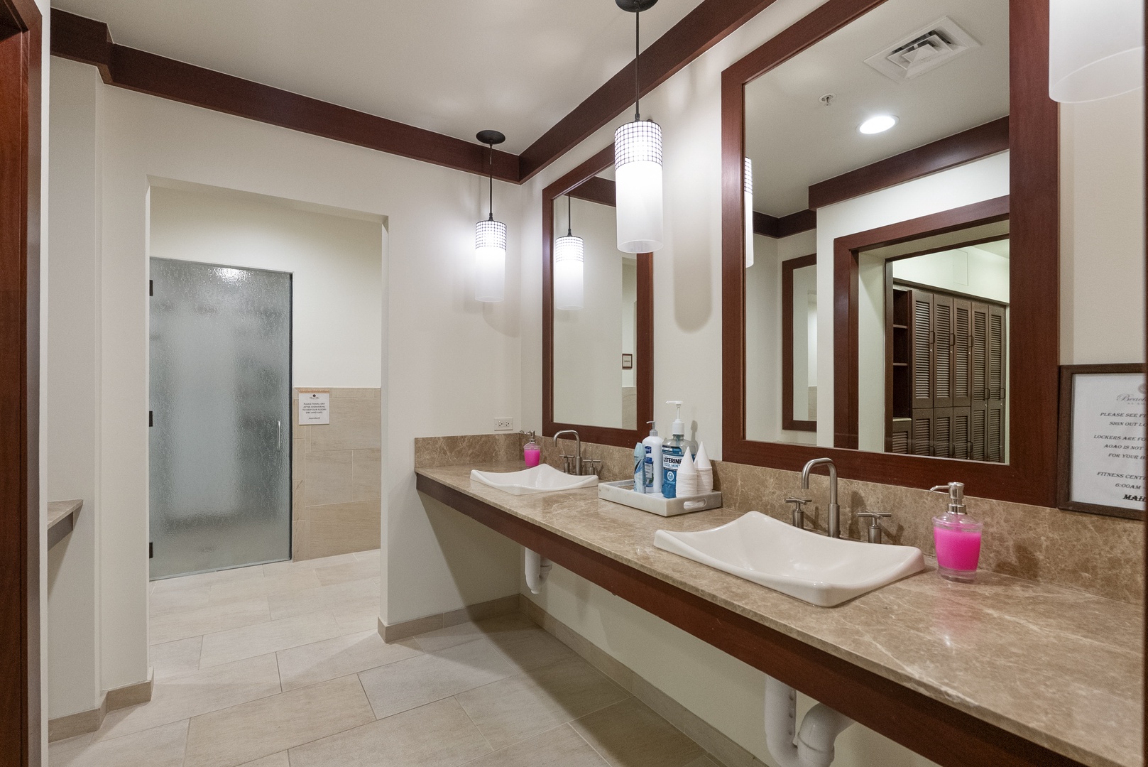 Twin vanities in the locker room, so the after-workout crowd never backs up.