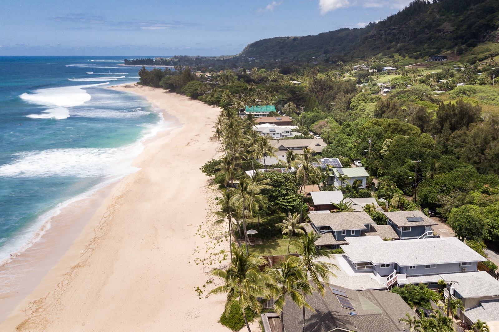 Haleiwa Vacation Rentals, Hale Nalu (Lower Level) - Marvel at the stunning North Shore coastline, right outside your beach home.