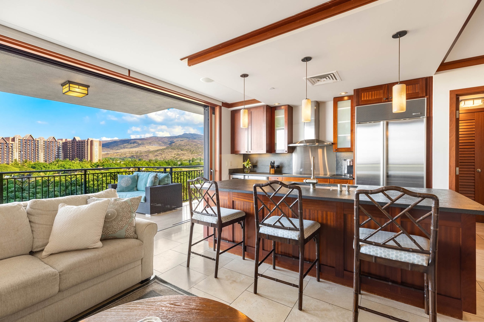 Kapolei Vacation Rentals, Ko Olina Beach Villa B604 - Whip up gourmet meals in this well-equipped kitchen featuring a spacious island bar.