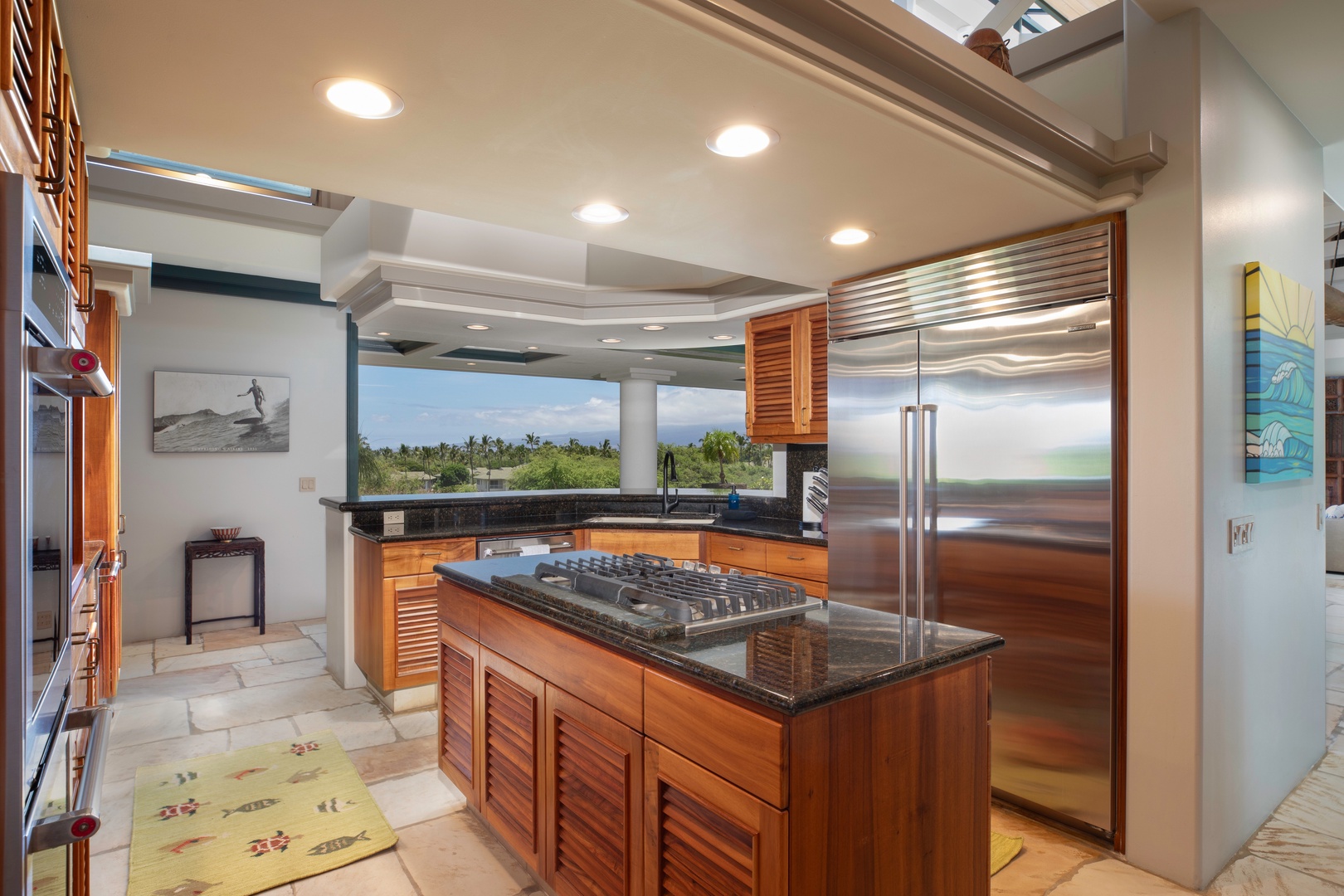 Kamuela Vacation Rentals, Canoe House at Champion Ridge - Cook together in a fully stocked kitchen with island seating—perfect for shared meals.