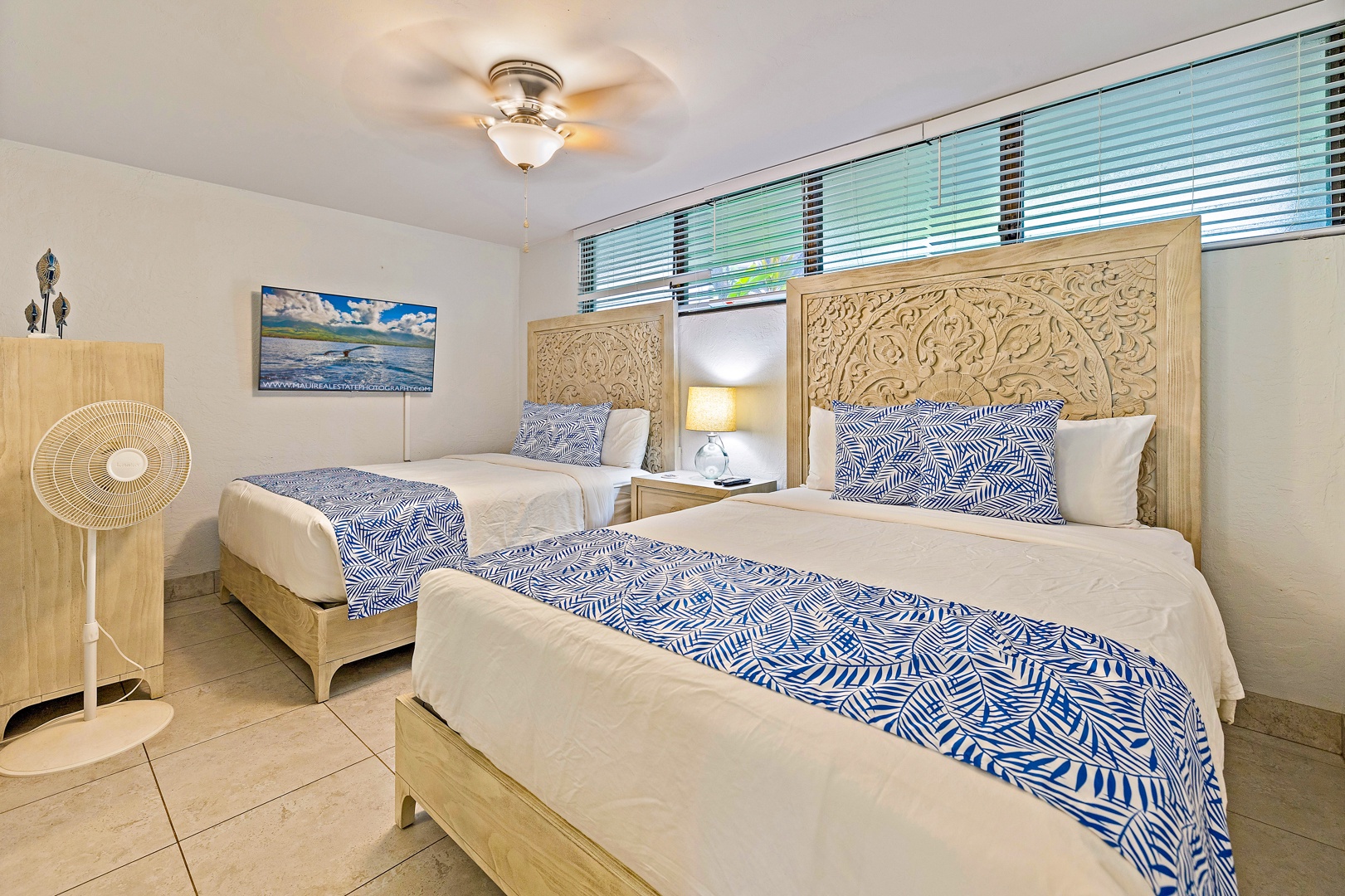 Lahaina Vacation Rentals, Papakea K-105 - The guest bedroom offers two beautifully crafted beds with intricate headboards and calming decor