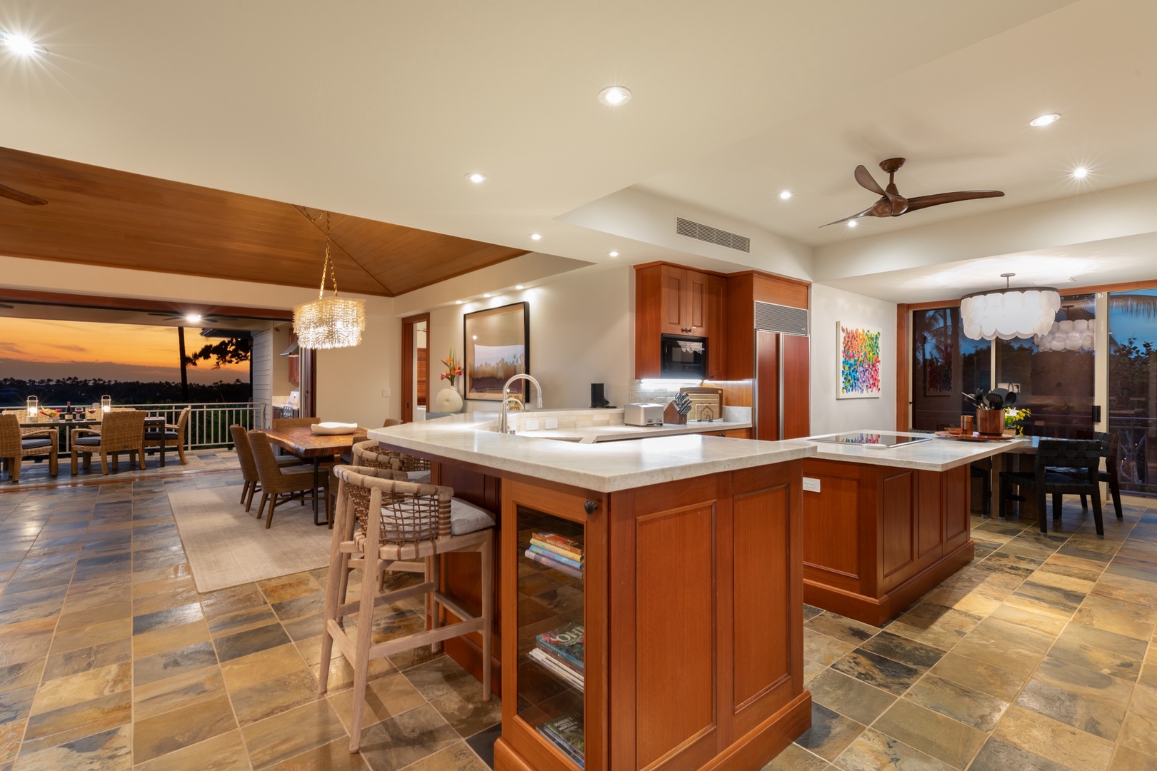 Kailua Kona Vacation Rentals, 3BD Waiulu Villa (111D) at Hualalai Resort - Your gourmet kitchen features rich wood cabinets, marble countertops, and a spacious island perfect for cooking and entertaining together.