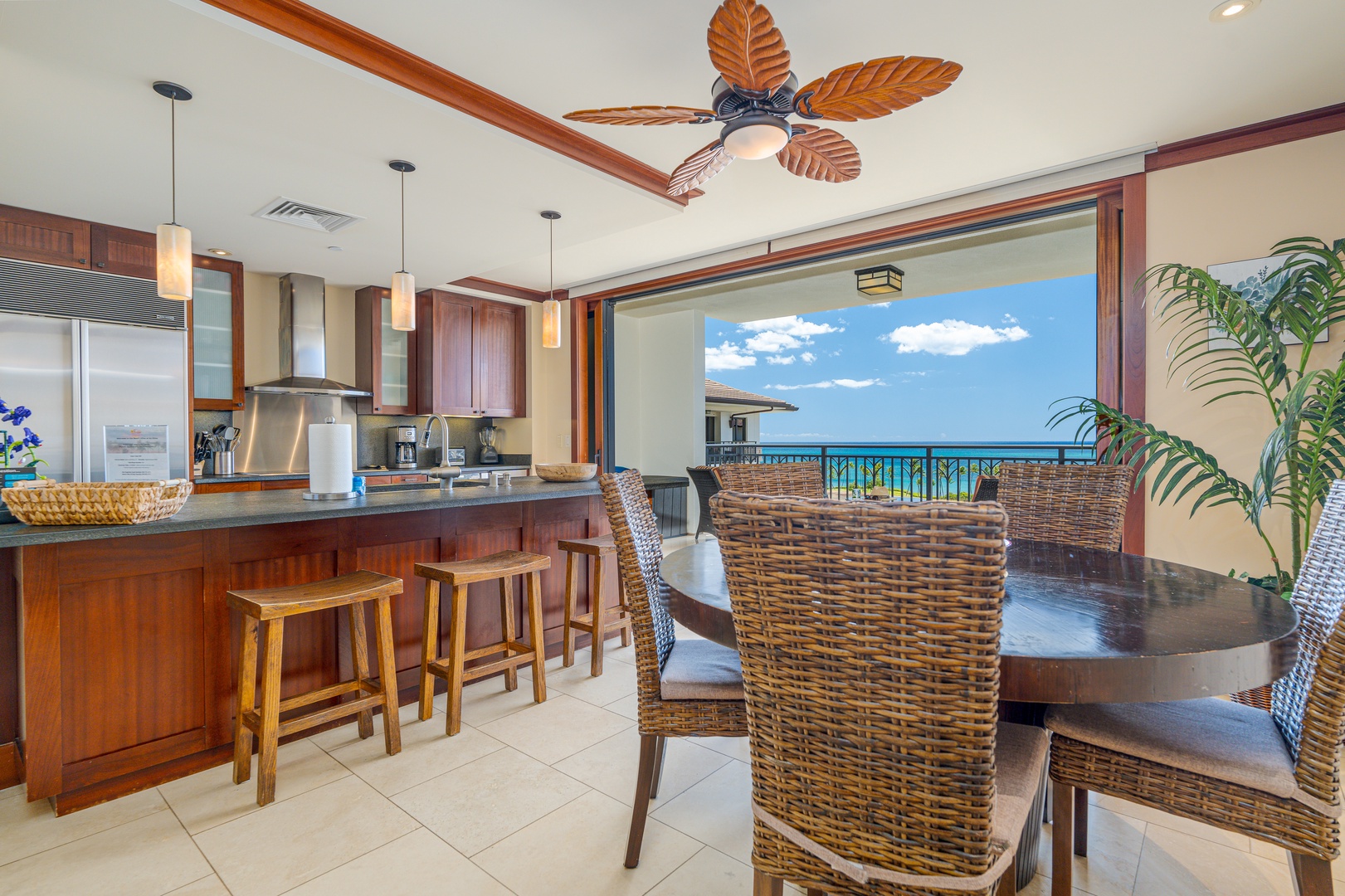 Kapolei Vacation Rentals, Ko Olina Beach Villas O904 - The kitchen with stainless steel appliances and ocean breezes.