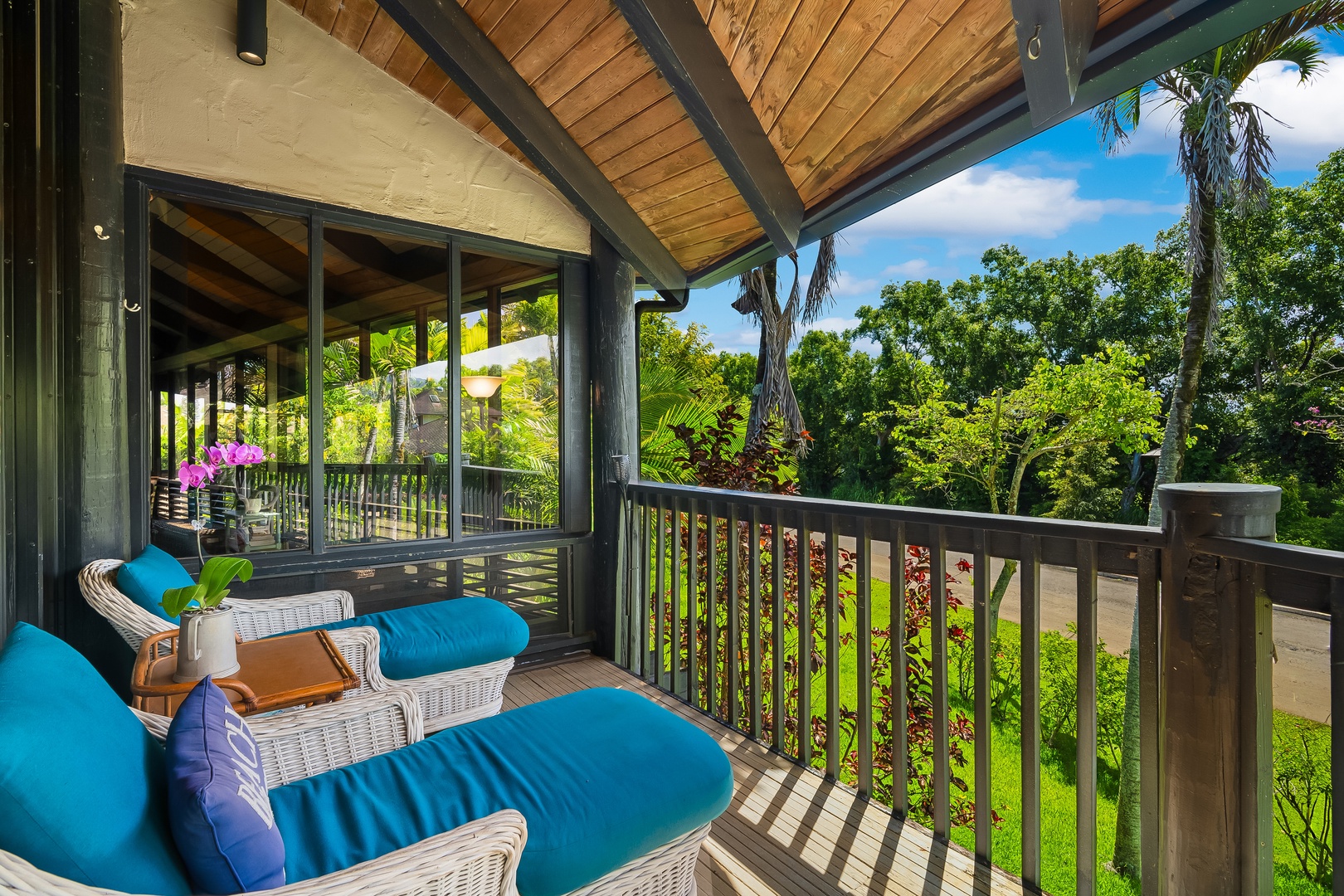 Princeville Vacation Rentals, Mauna Kai 7B - Sink into the cushions where the covered lanai keeps the sun off past noon.