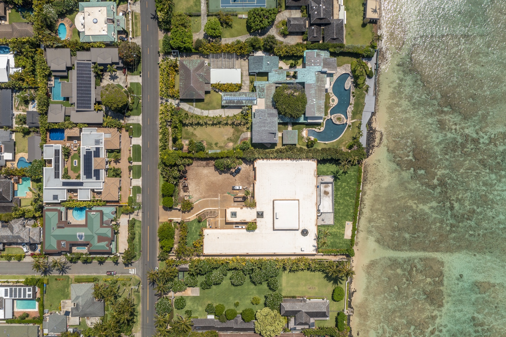 Honolulu Vacation Rentals, The Kahala Mansion Event Venue - Aerial view highlighting the spacious property and its beautiful surroundings in a serene neighborhood.