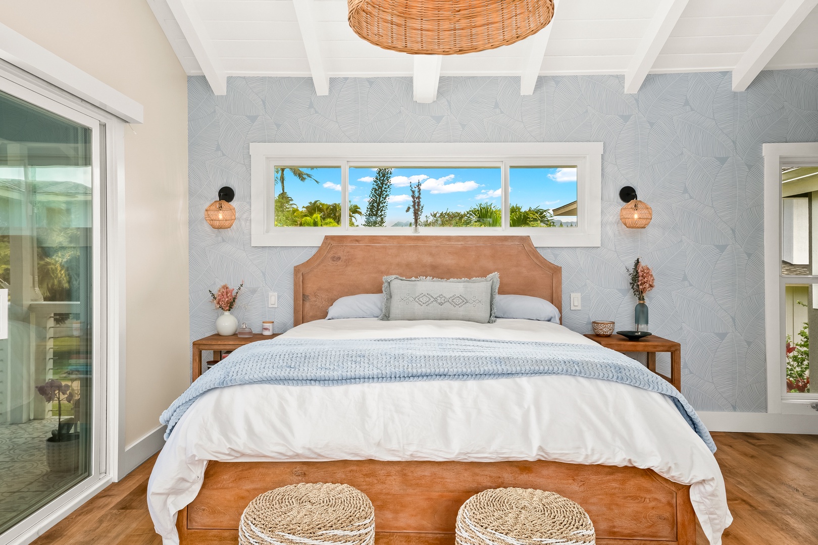 Princeville Vacation Rentals, Ola Hou - Main House - Find comfort and style in this thoughtfully decorated bedroom with a peaceful atmosphere.