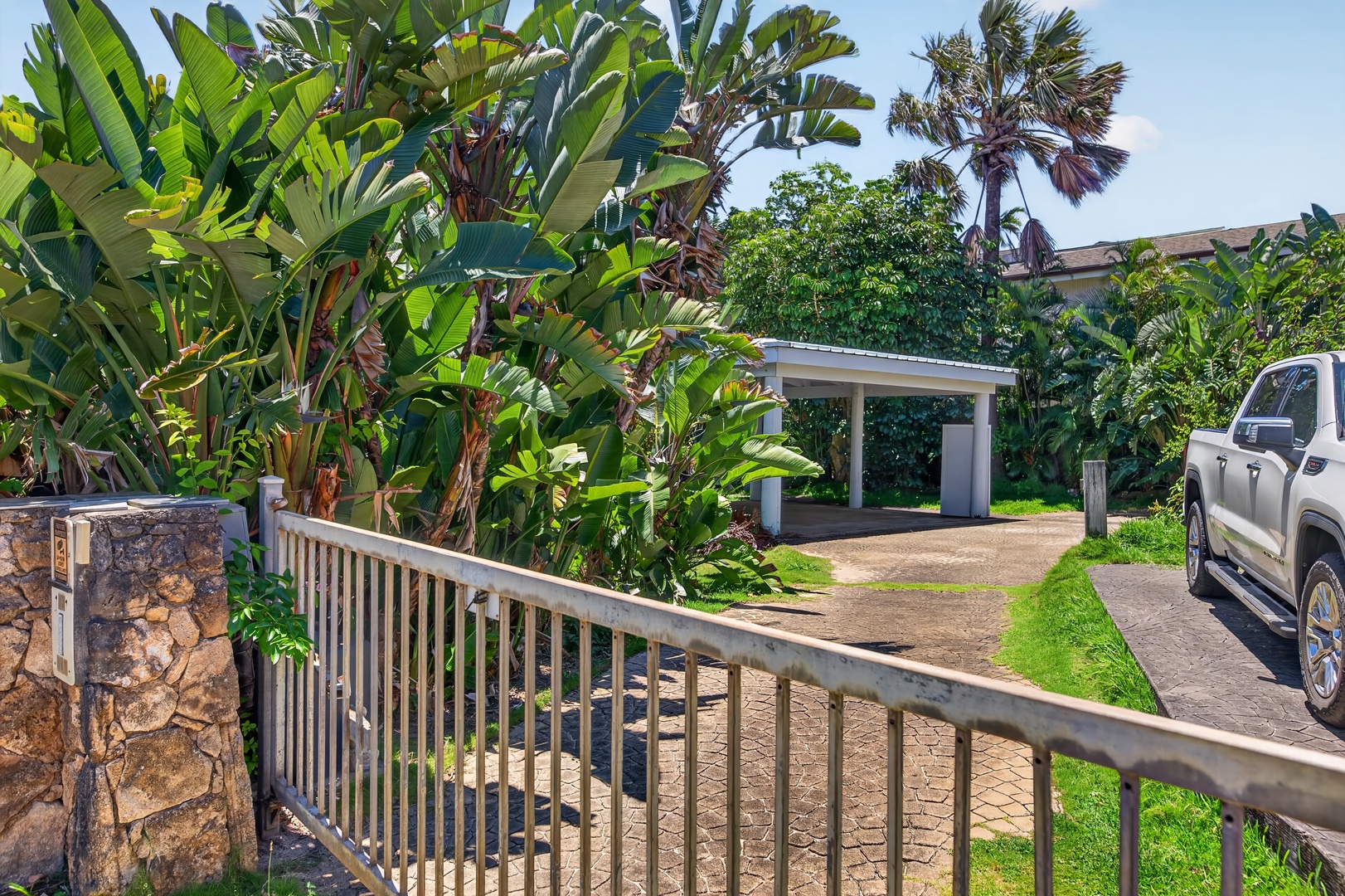 Haleiwa Vacation Rentals, Sunset Beach Hideaway - Tropical greenery and a quiet residential setting welcome you to this island retreat.