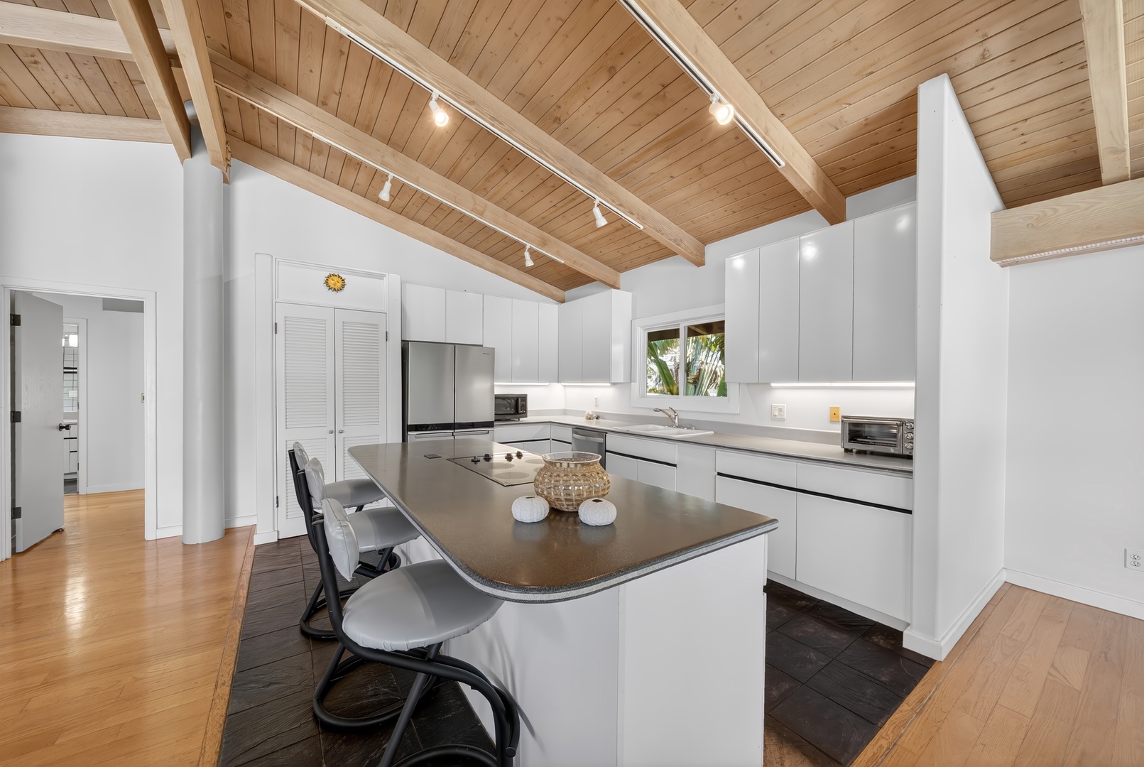 Haleiwa Vacation Rentals, Sunset Beach Hideaway - Cook comfortably in the fully stocked kitchen with generous prep space and bar seating.
