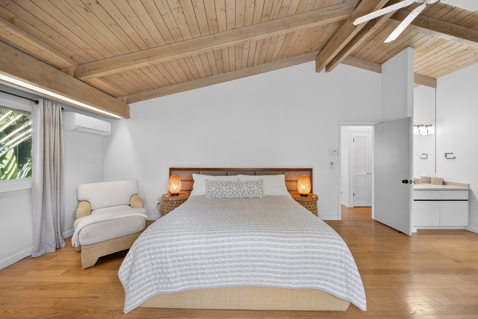 Haleiwa Vacation Rentals, Sunset Beach Hideaway - Wake up refreshed in this airy bedroom with soaring ceilings and garden views nearby.