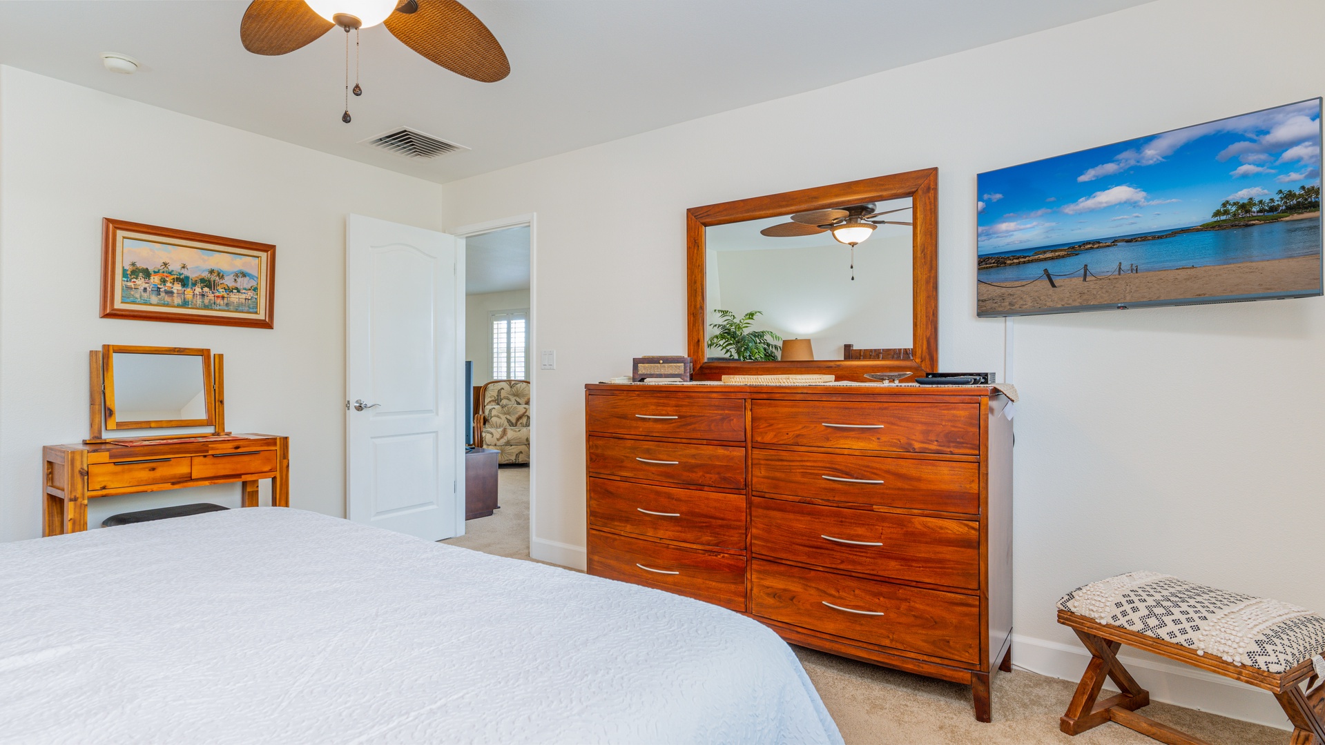 Kapolei Vacation Rentals, Ko Olina Kai 1057B - The primary guest bedroom with soft linens and natural lighting.
