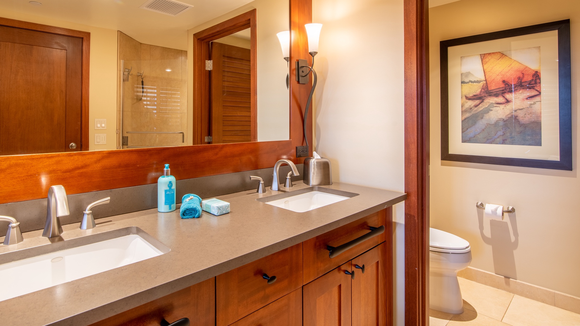 Kapolei Vacation Rentals, Ko Olina Beach Villas B608 - The primary guest bathroom is equipped with a double vanity, offering space and convenience in this Hawaiian retreat.