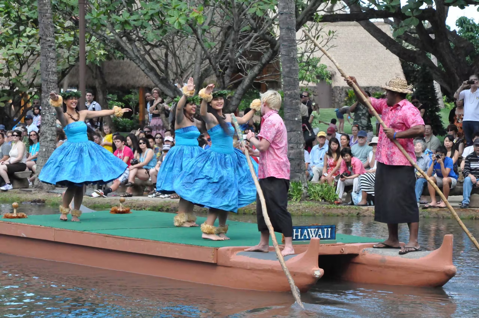 Hauula Vacation Rentals, Private Beach Paradise - A canoe pageant on the water, part of the island's cultural shows nearby.