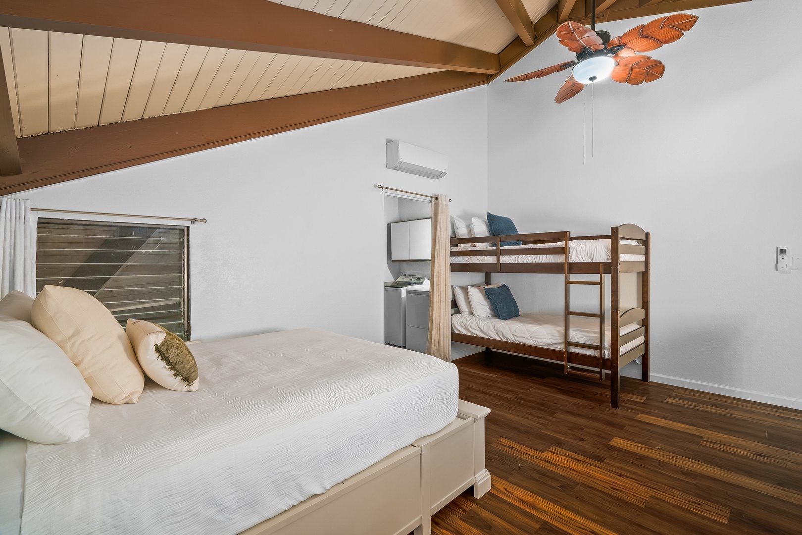 Princeville Vacation Rentals, Mauna Kai 7B - Wood beams overhead and two ways to sleep make it easy to split up the lofted area.