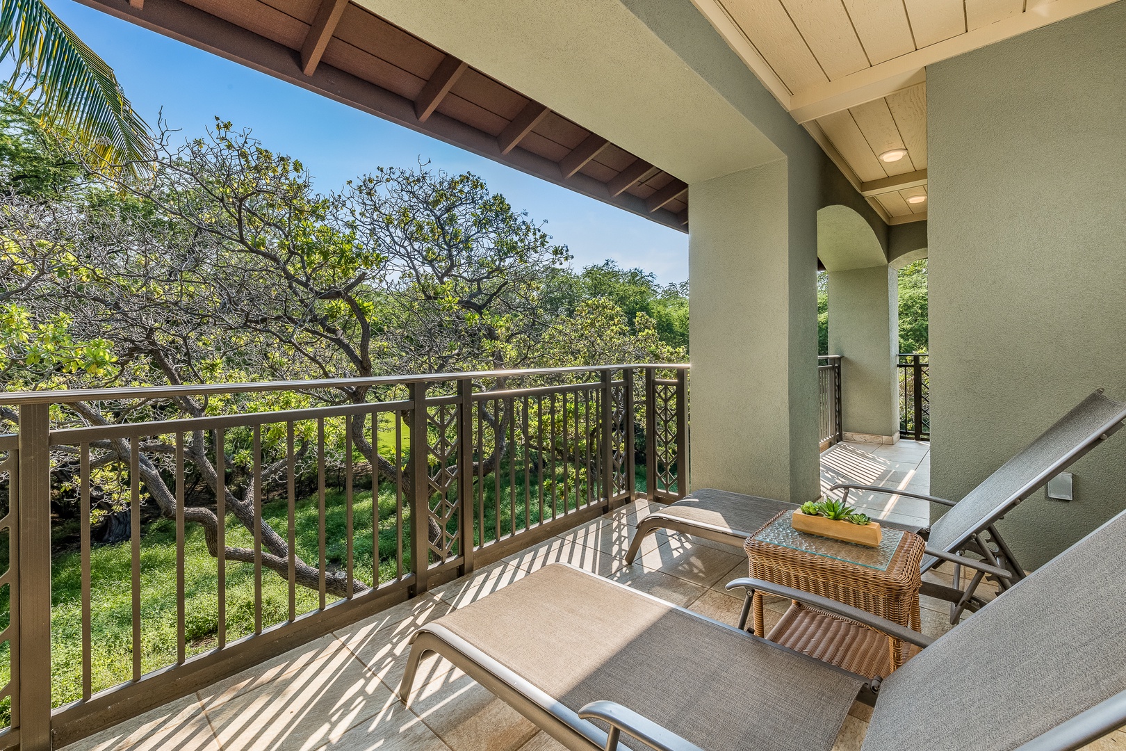 Kamuela Vacation Rentals, Mauna Lani Fairways #204 - Lounge among the treetops on your private lanai—ideal for sipping coffee, journaling, or relaxing in island serenity.