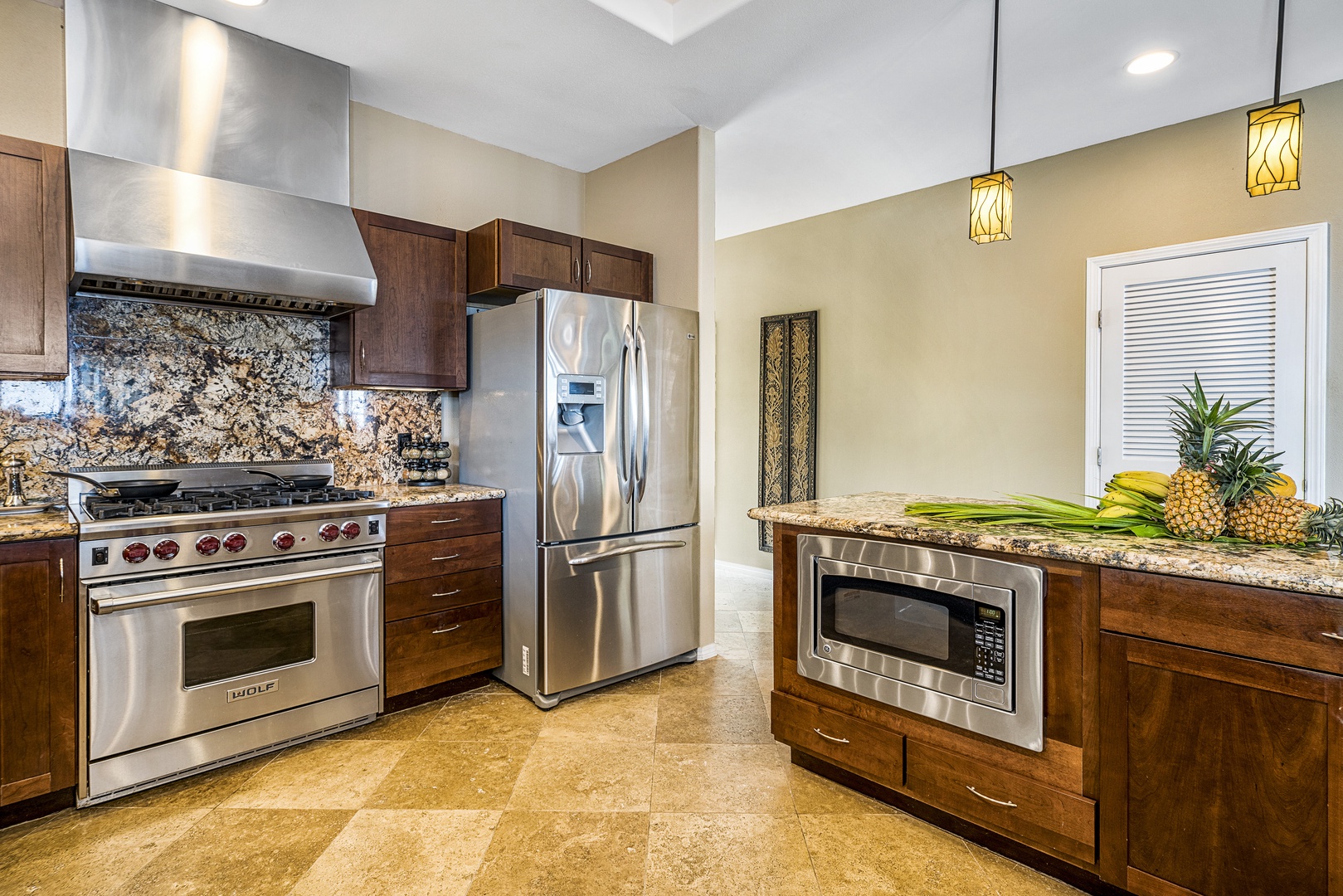 Kailua Kona Vacation Rentals, Sunset Hale - Create culinary magic with the Wolf gas range and oversized island—every meal is a moment.