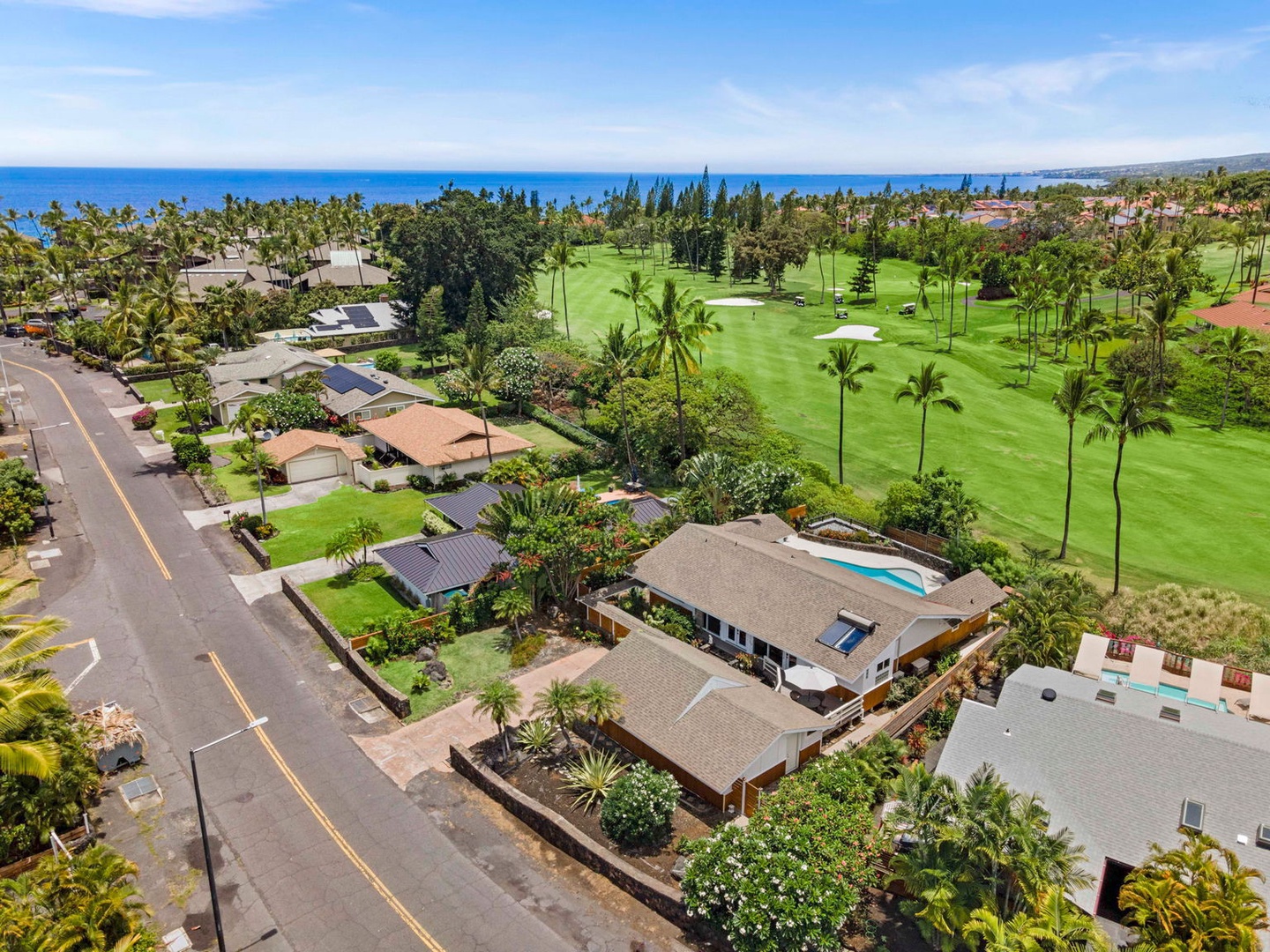 Kailua Kona Vacation Rentals, Manukai Hale - The neighborhood rolls down toward the water past the golf fairways.