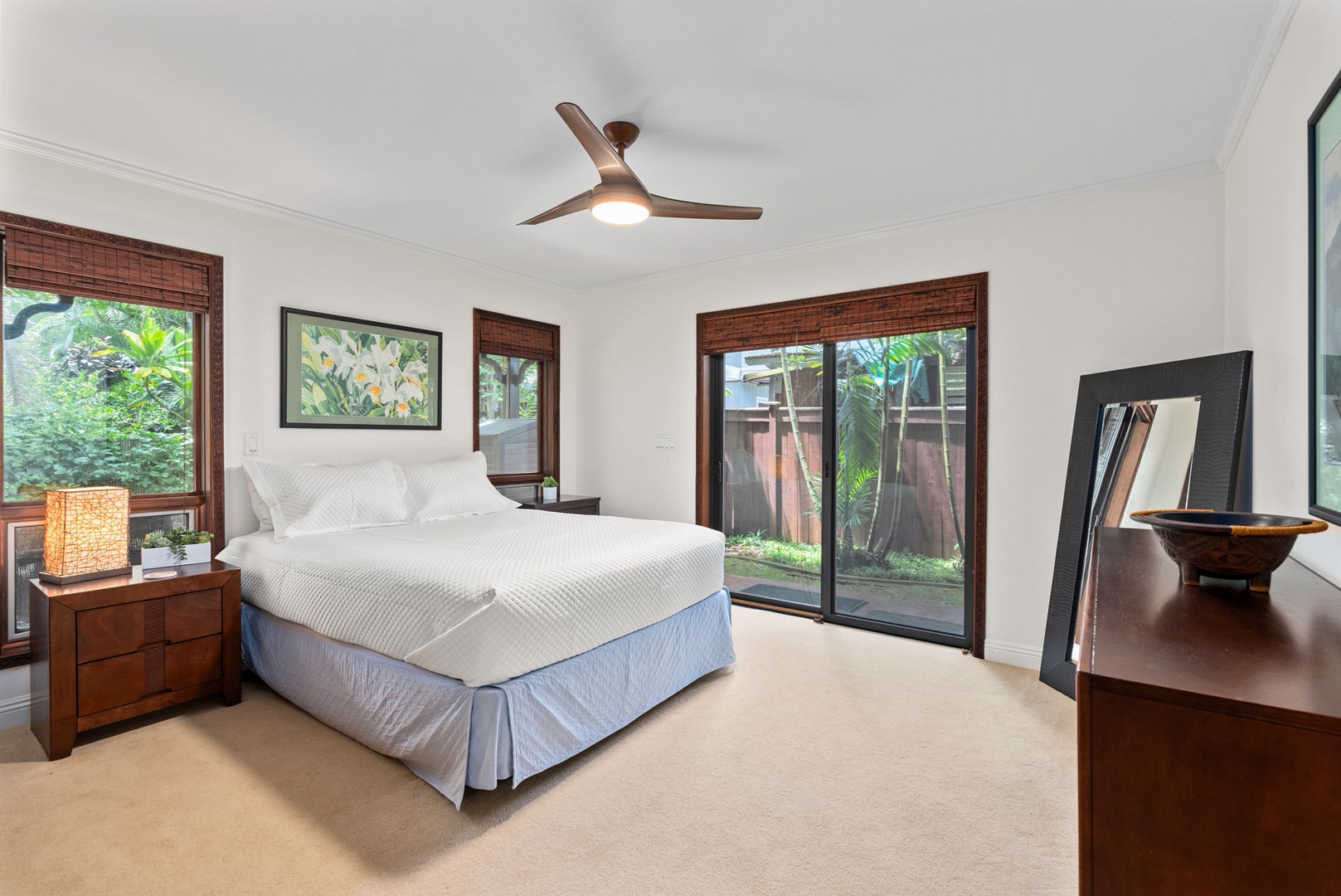 Haleiwa Vacation Rentals, Kealoha Tropical Beach Villa - The downstair guest bedroom three offers a queen-sized bed and private access to the garden.