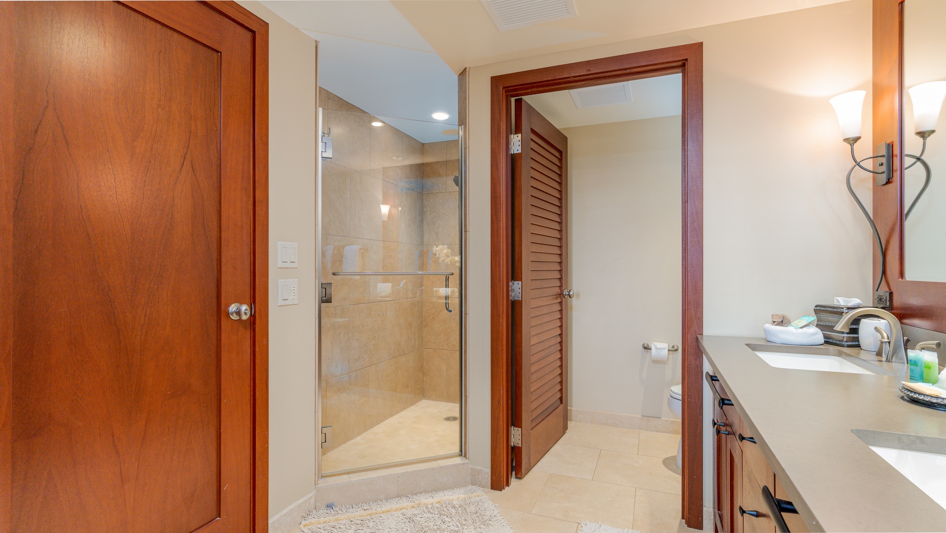Kapolei Vacation Rentals, Ko Olina Beach Villas B1101 - The primary guest bathroom has a walk-in shower.