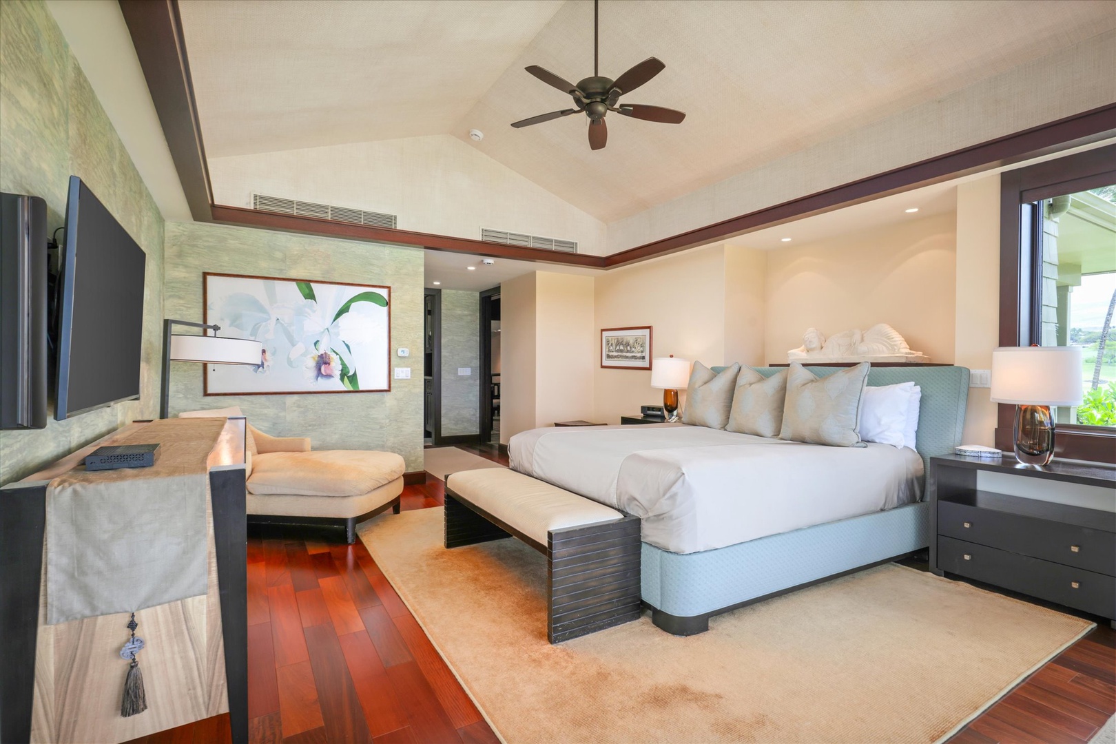 Kailua Kona Vacation Rentals, Wai'ulu Villa 115D - King bed, flat-screen TV, and direct access to lush views—elegant and inviting for serene mornings.