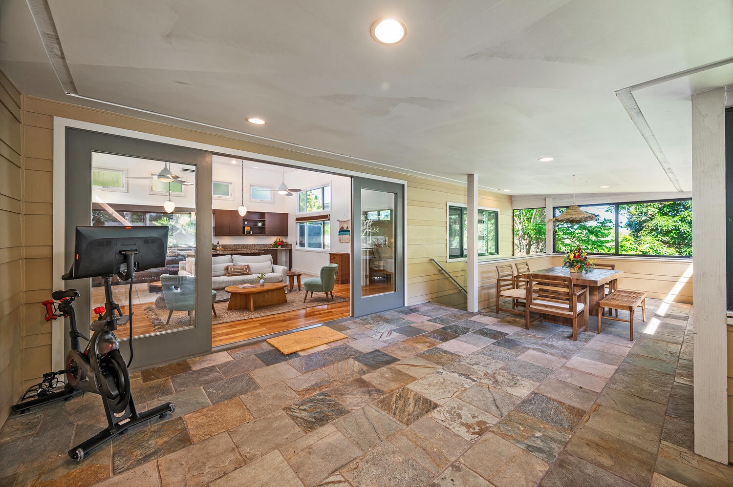 Kailua Vacation Rentals, Hale Honi La - Large indoor/outdoor dining and lounge area complete with a Peloton!