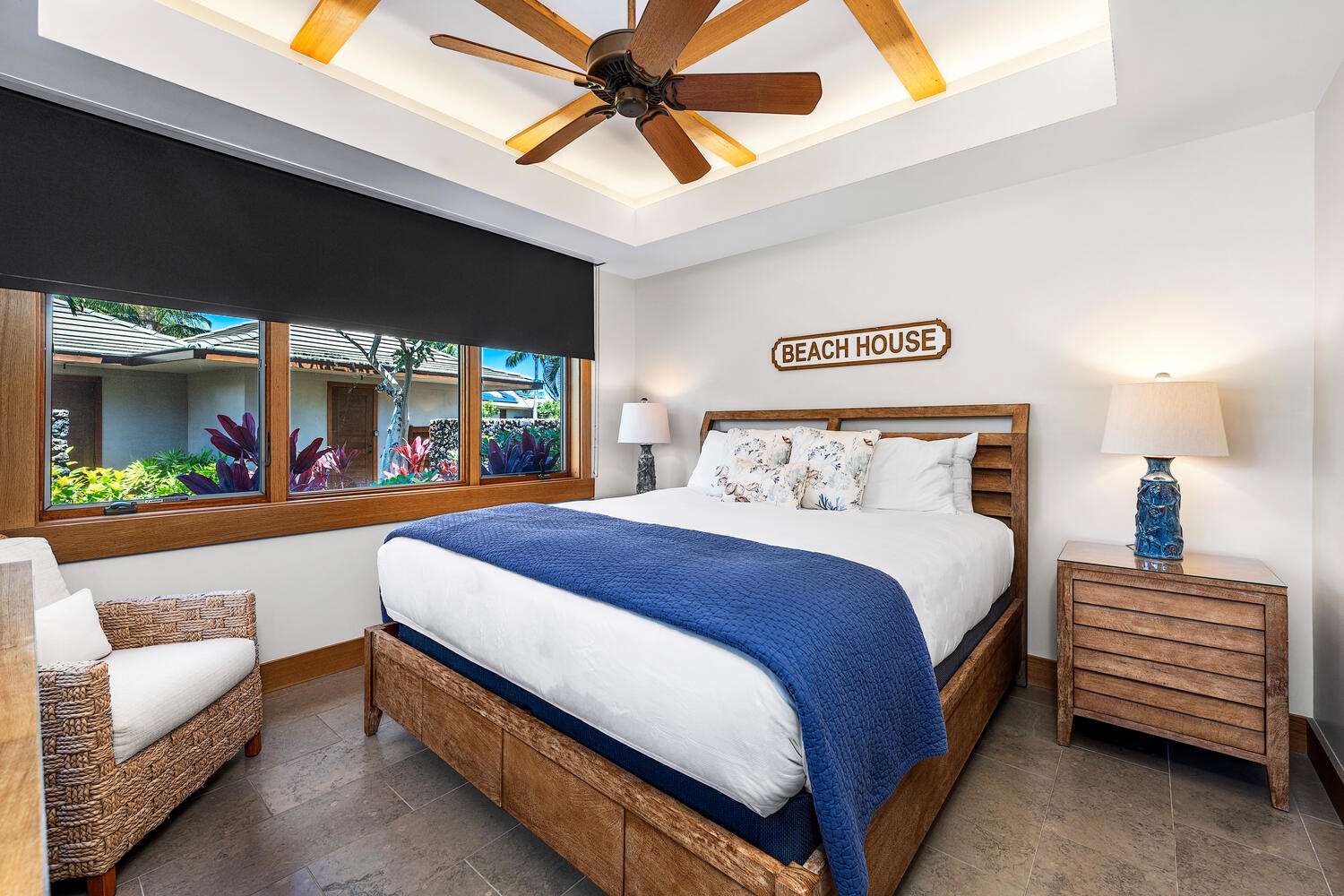 Kamuela Vacation Rentals, Laule'a at the Mauna Lani Resort #14 - Guest suite with king bed, tropical garden views, and ensuite bath.