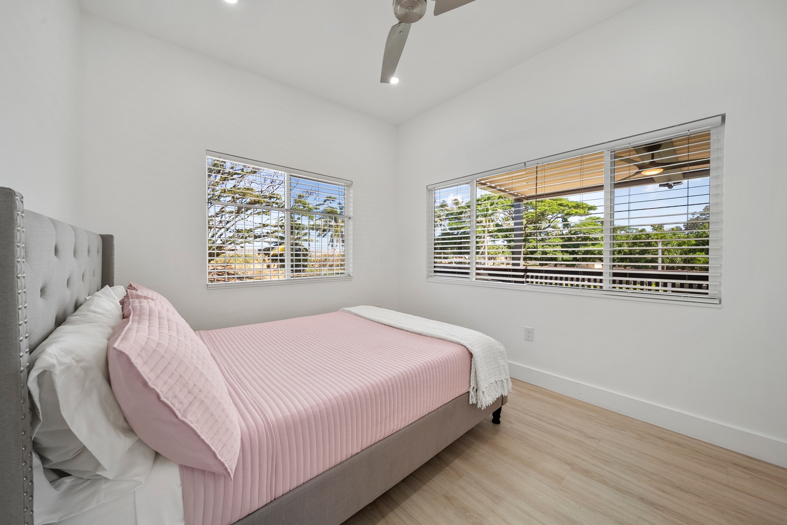 Haleiwa Vacation Rentals, Sunset Beach Island Retreat - This bright airy primary suite features large windows that let in natural light and offer serene views