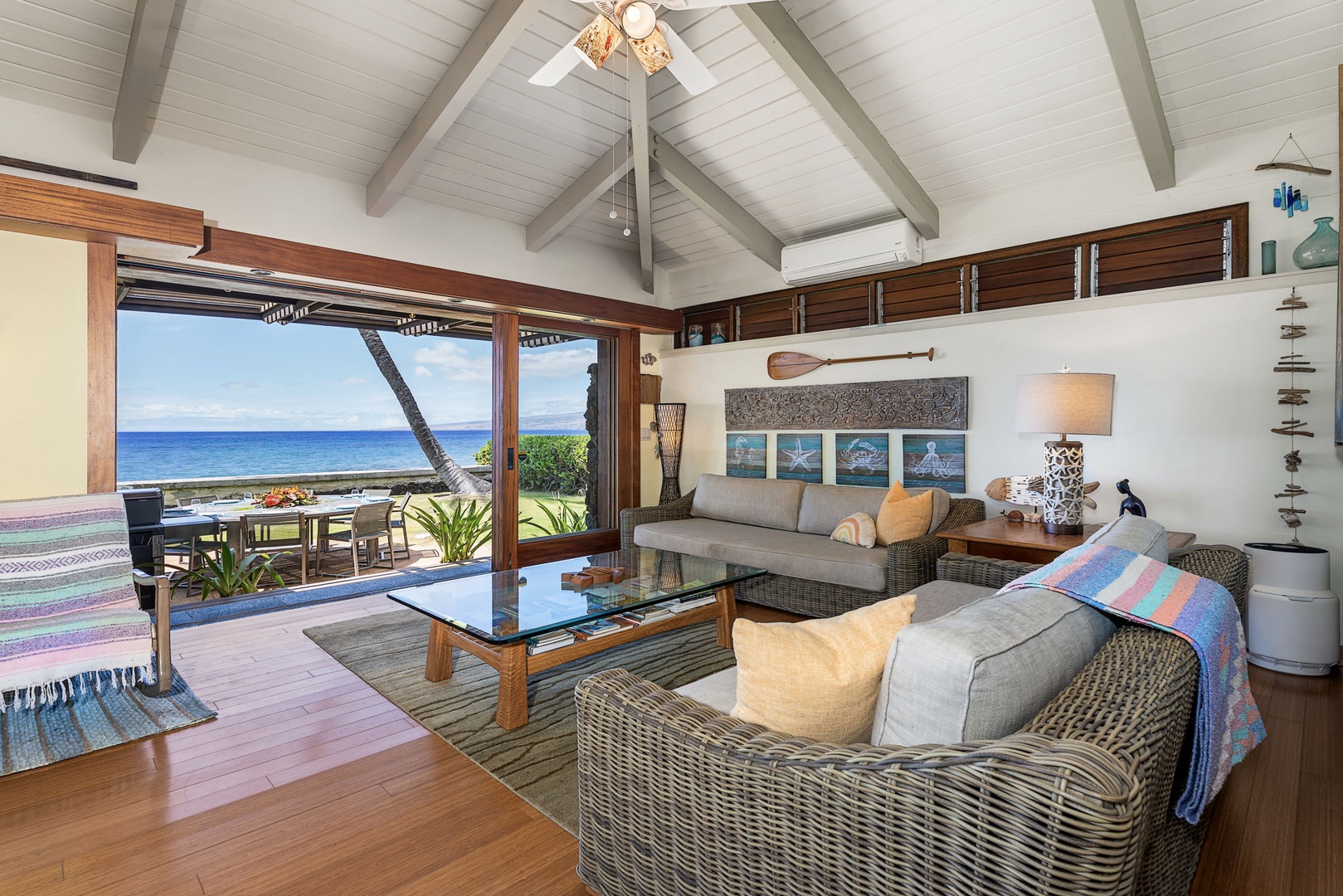 Kamuela Vacation Rentals, Island Time Retreat - The living room’s sliding glass doors open to the lanai, bringing the ocean view into the heart of the space.