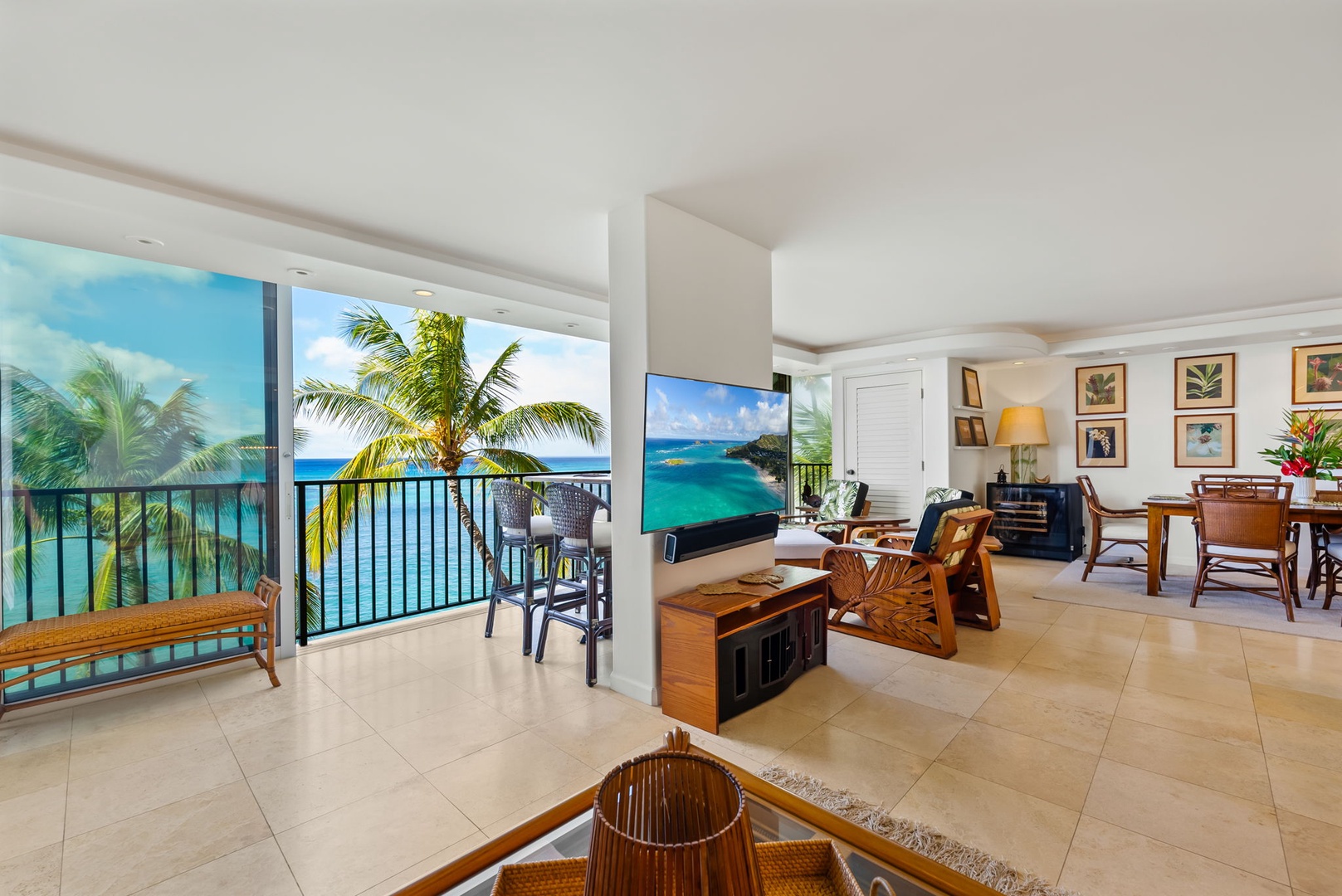 Honolulu Vacation Rentals, Kaimana Beach Penthouse - Indoor-outdoor living at its finest—relax with panoramic ocean views, both from the living room and the balcony.