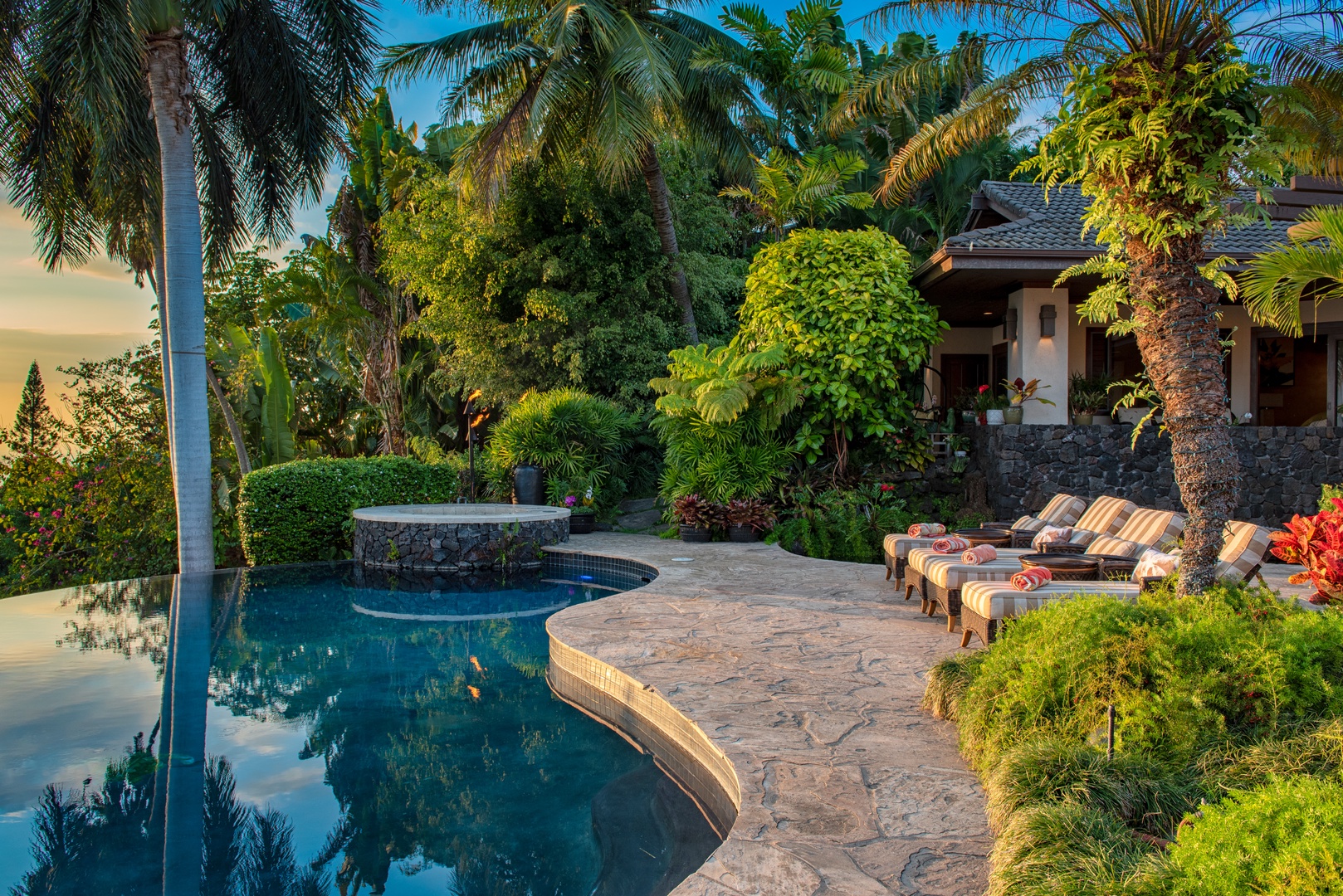 Kailua Kona Vacation Rentals, Hale Wailele** - French Limestone walkways connect each pavilion