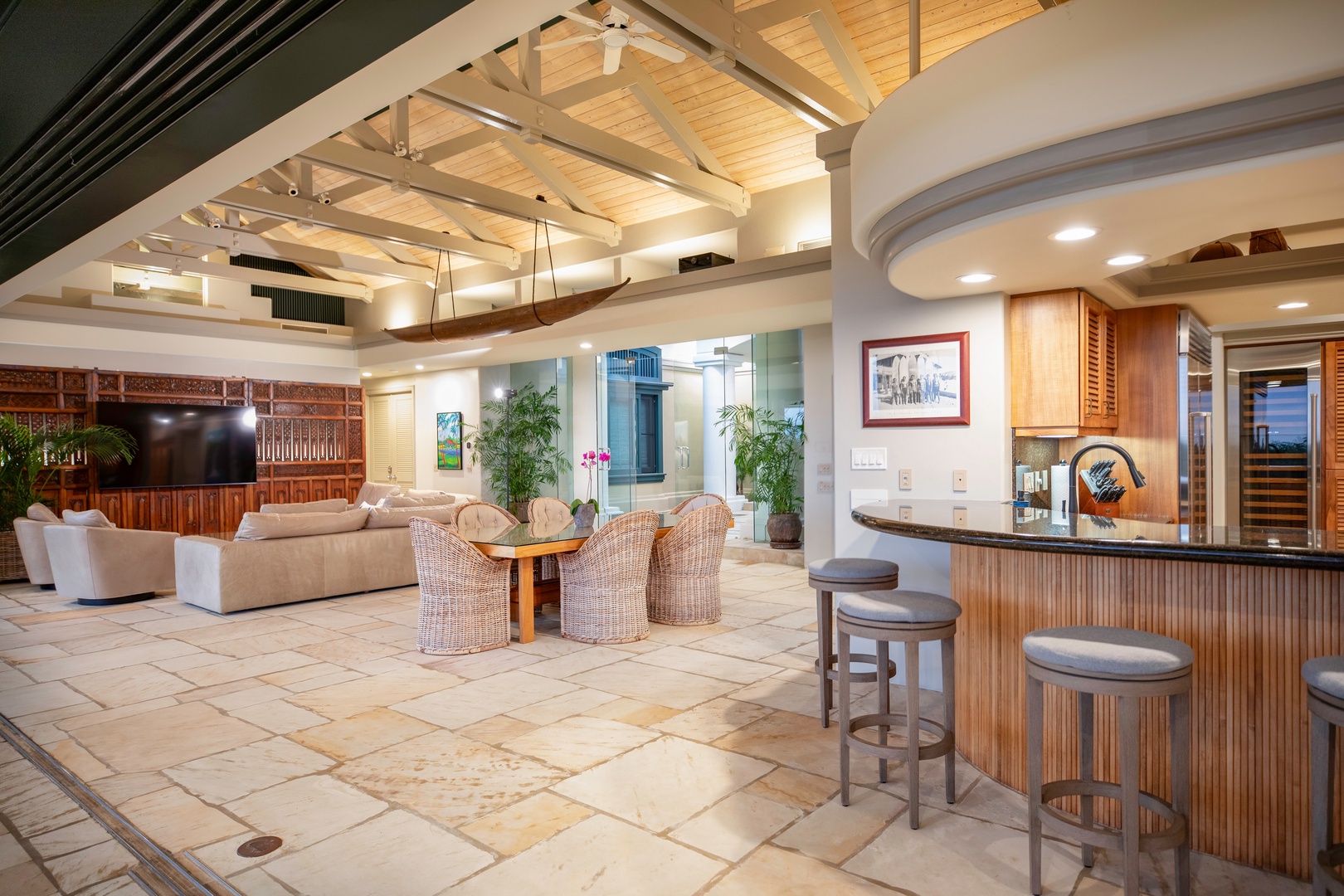 Kamuela Vacation Rentals, Canoe House at Champion Ridge - Indoor-outdoor dining area with comfortable wicker chairs and stunning views.