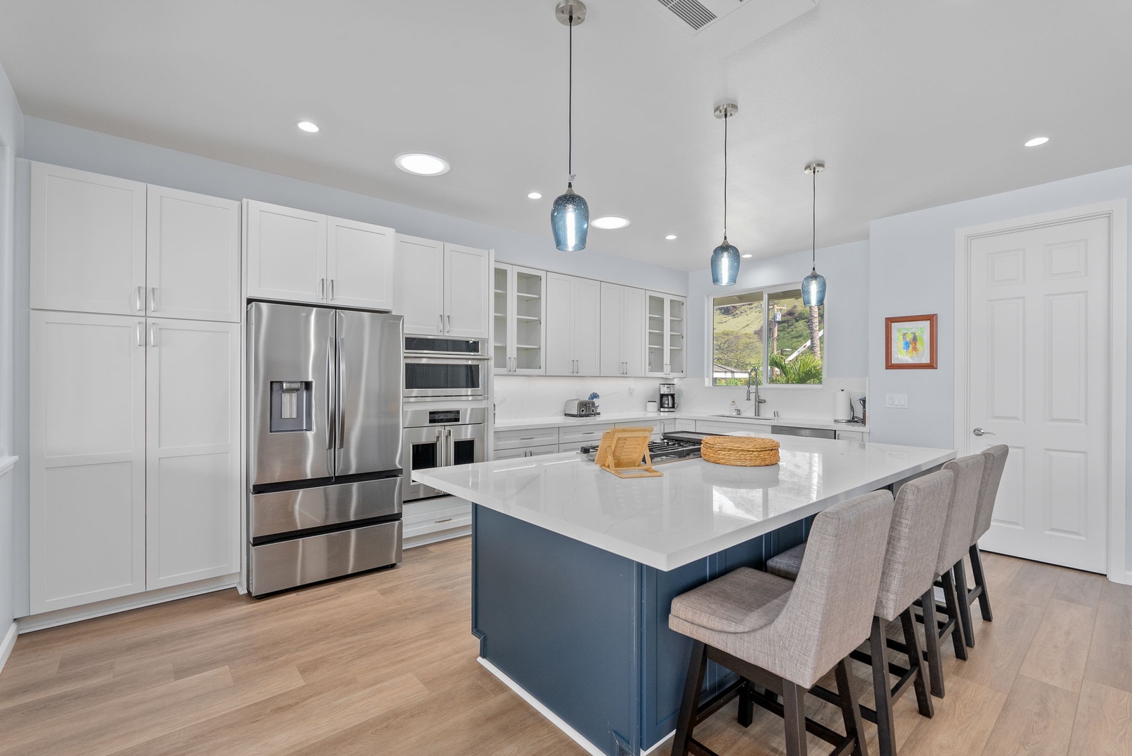 Waianae Vacation Rentals, Oceanfront Luxury Dream Estate - Full upstairs kitchen with walk-in pantry, oversized island, and natural light throughout.