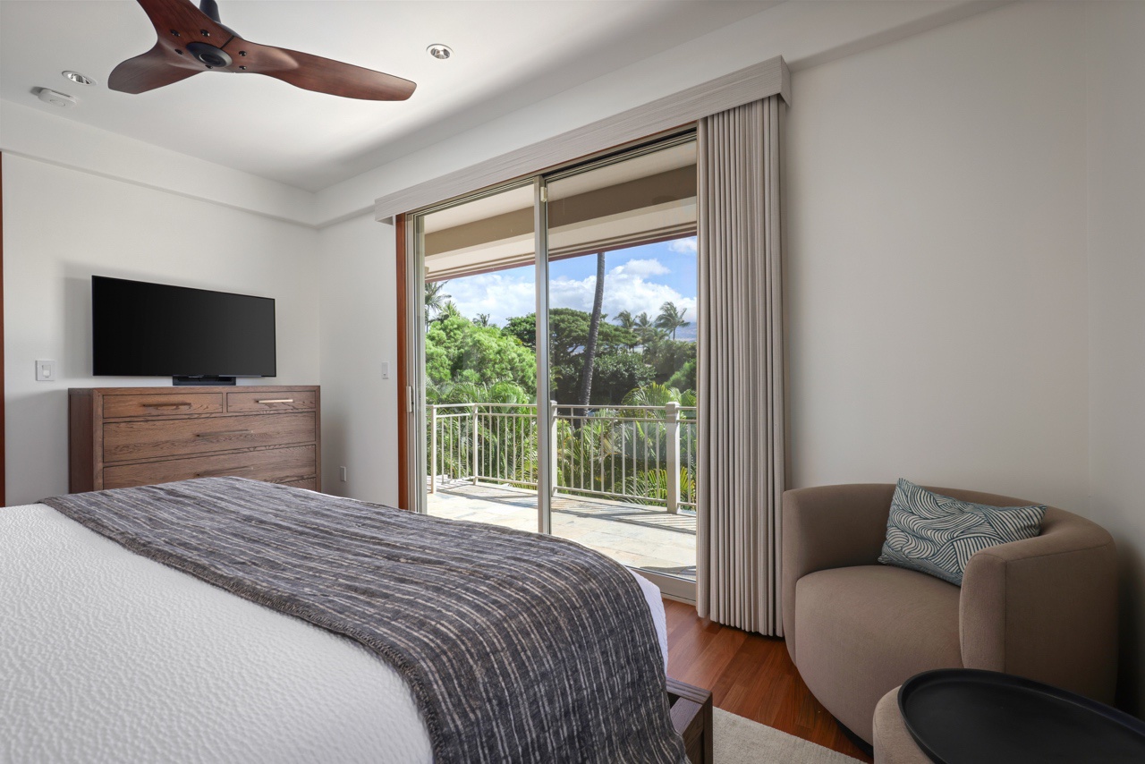 Kailua Kona Vacation Rentals, 3BD Ka'Ulu Villa (109A) at Hualalai Resort - Reverse view of bedroom showcasing wall-mounted Smart TV and lanai access.