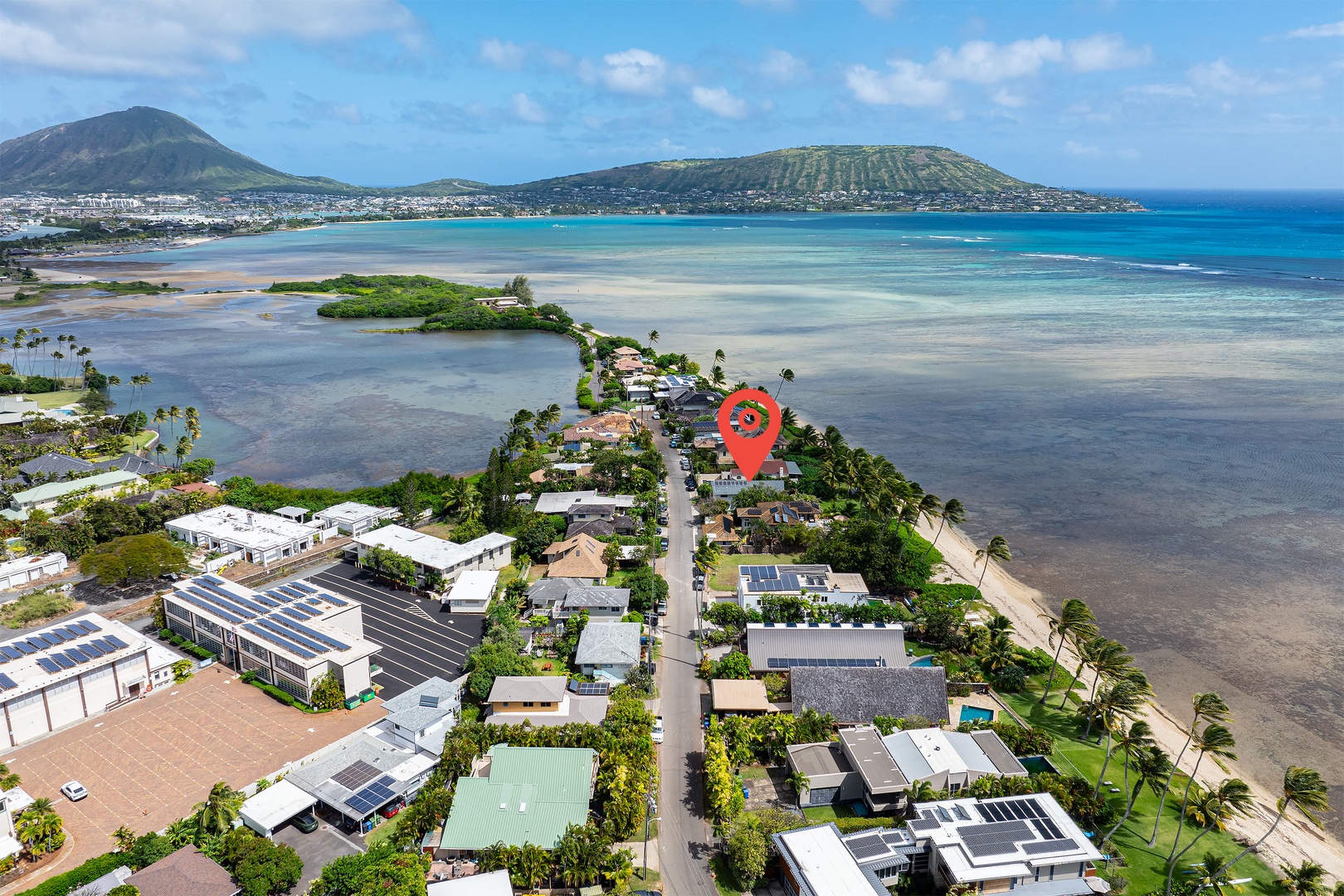 Honolulu Vacation Rentals, Honolulu Beachfront Retreat - Panoramic aerial with Diamond Head in the background, placing guests close to one of Oahu’s most iconic landmarks and attractions.