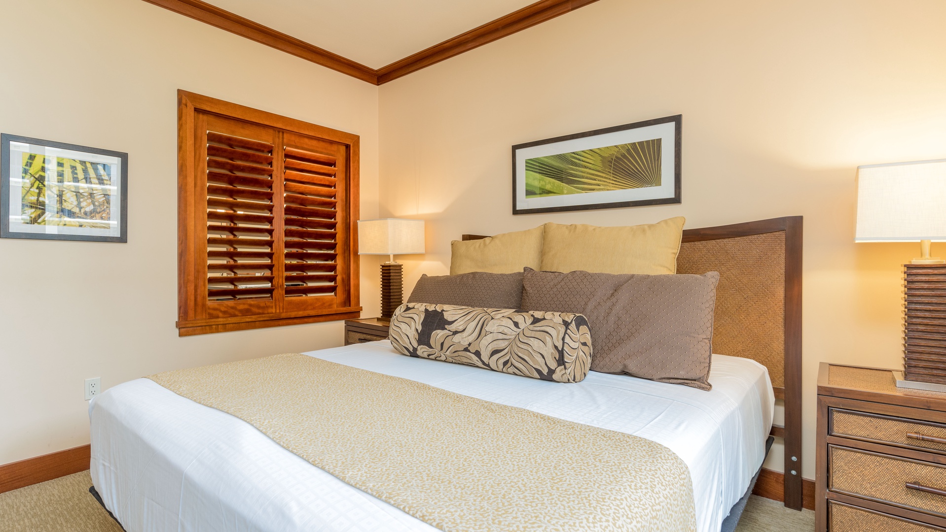 Kapolei Vacation Rentals, Ko Olina Beach Villas O521 - Warm wood tones and tasteful decor in the primary guest bedroom.