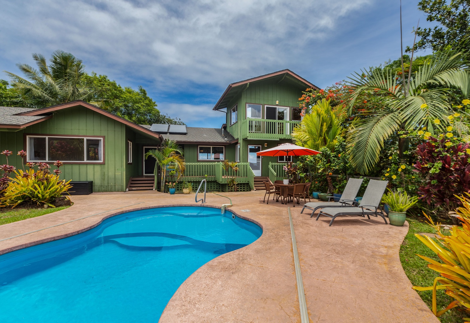 Princeville Vacation Rentals, Hale Ohia - Soak up the sun poolside or jump in for a refreshing swim in the private pool