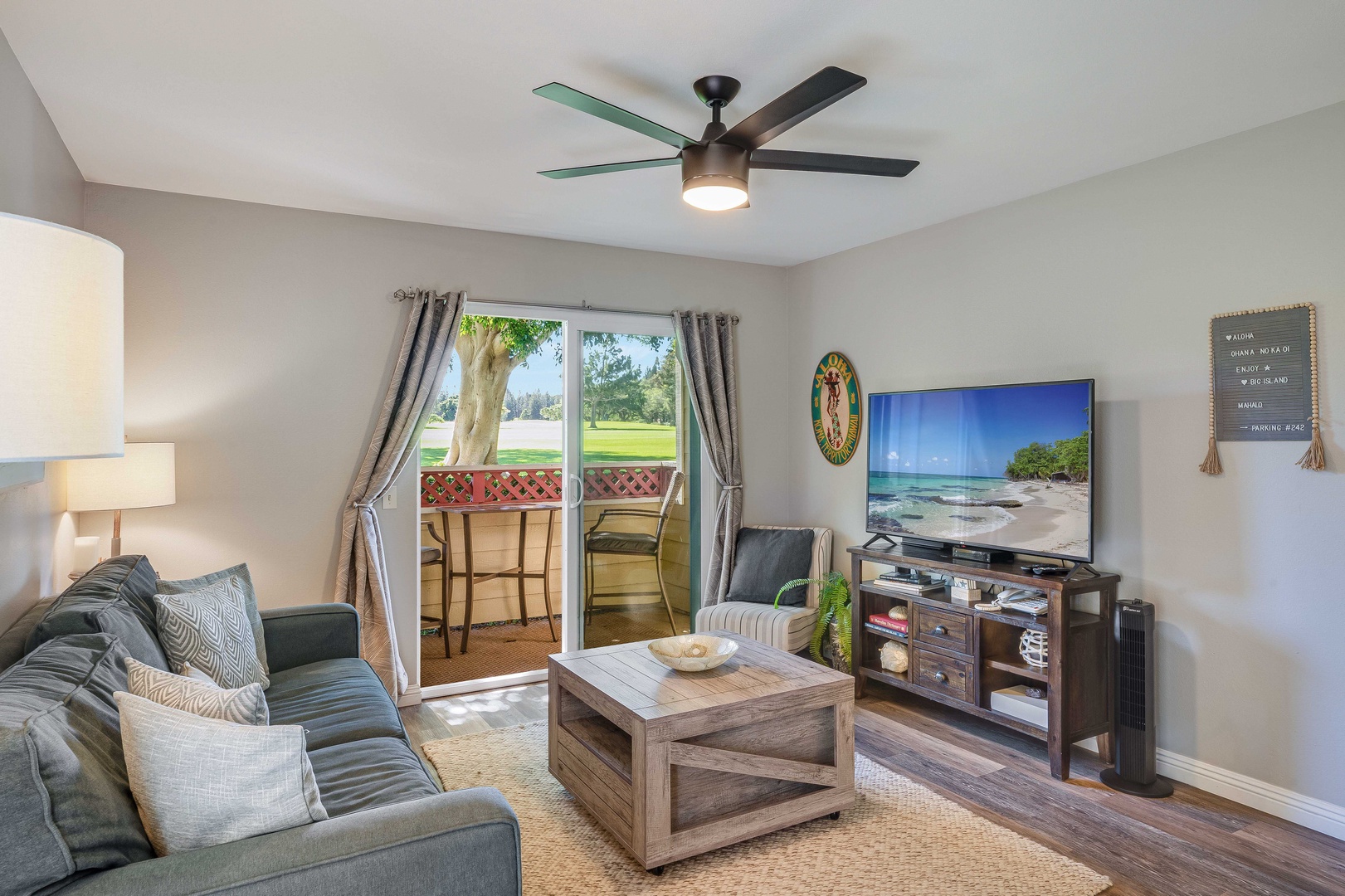 Waikoloa Vacation Rentals, Fairway Terrace F-107 - Living room offers views of lush golf course (2)