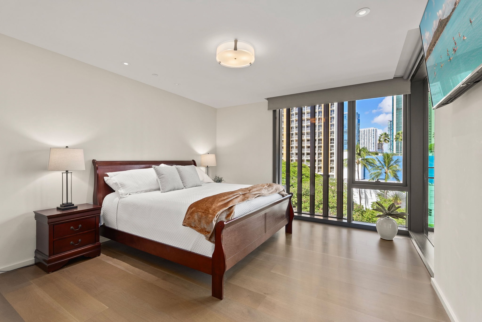 Honolulu Vacation Rentals, Park Lane Getaway - Serene second bedroom retreat with king-sized bed and lush views.