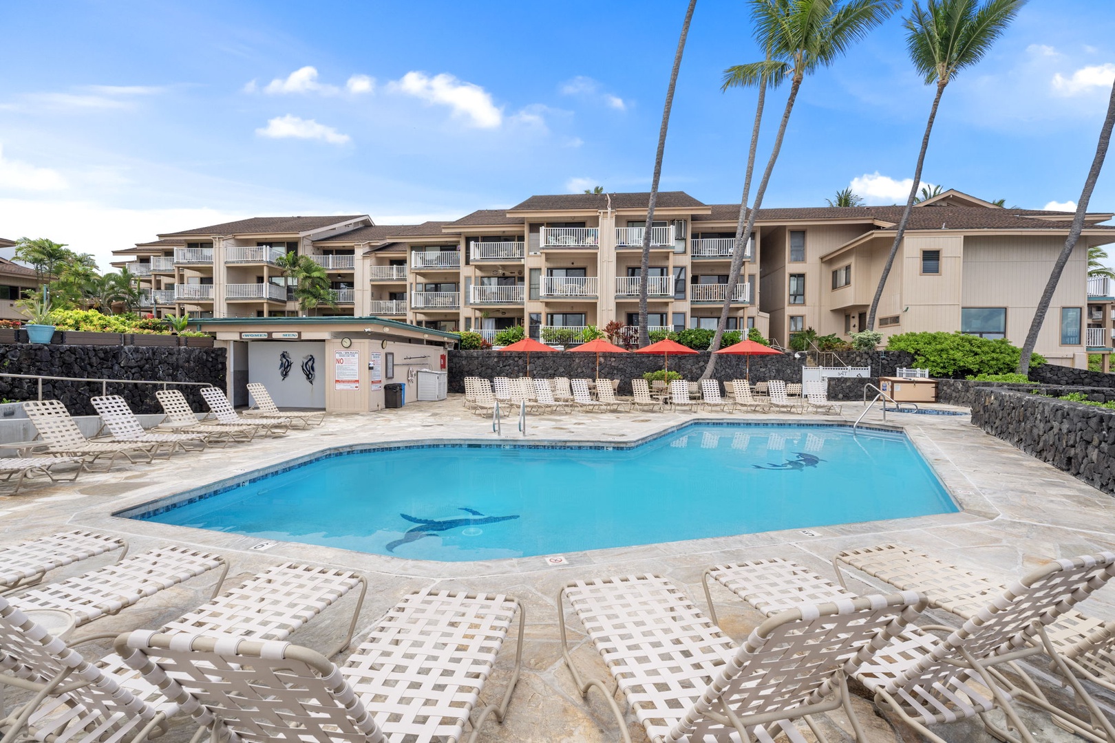 Kailua Kona Vacation Rentals, Sea Village 4213 - Resort-style pool surrounded by tropical landscaping—relax just steps from your unit.