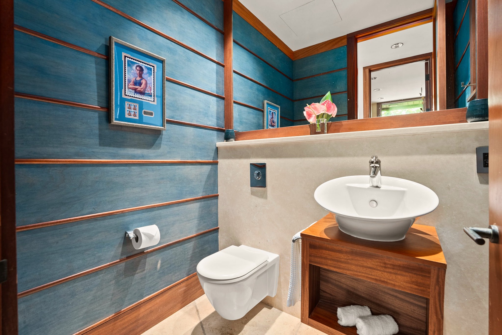 Kailua Vacation Rentals, Kailua Sands - Powder room with bold blue accent wall.