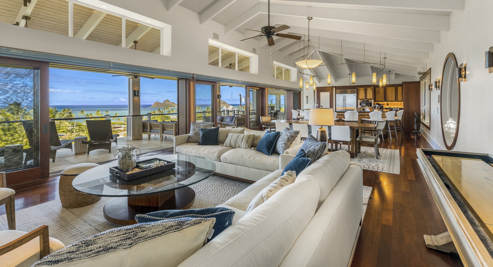 Kailua Vacation Rentals, Lanikai Villa** - The main living area is spacious with a large sectional sofa and gorgeous views through the sliding doors